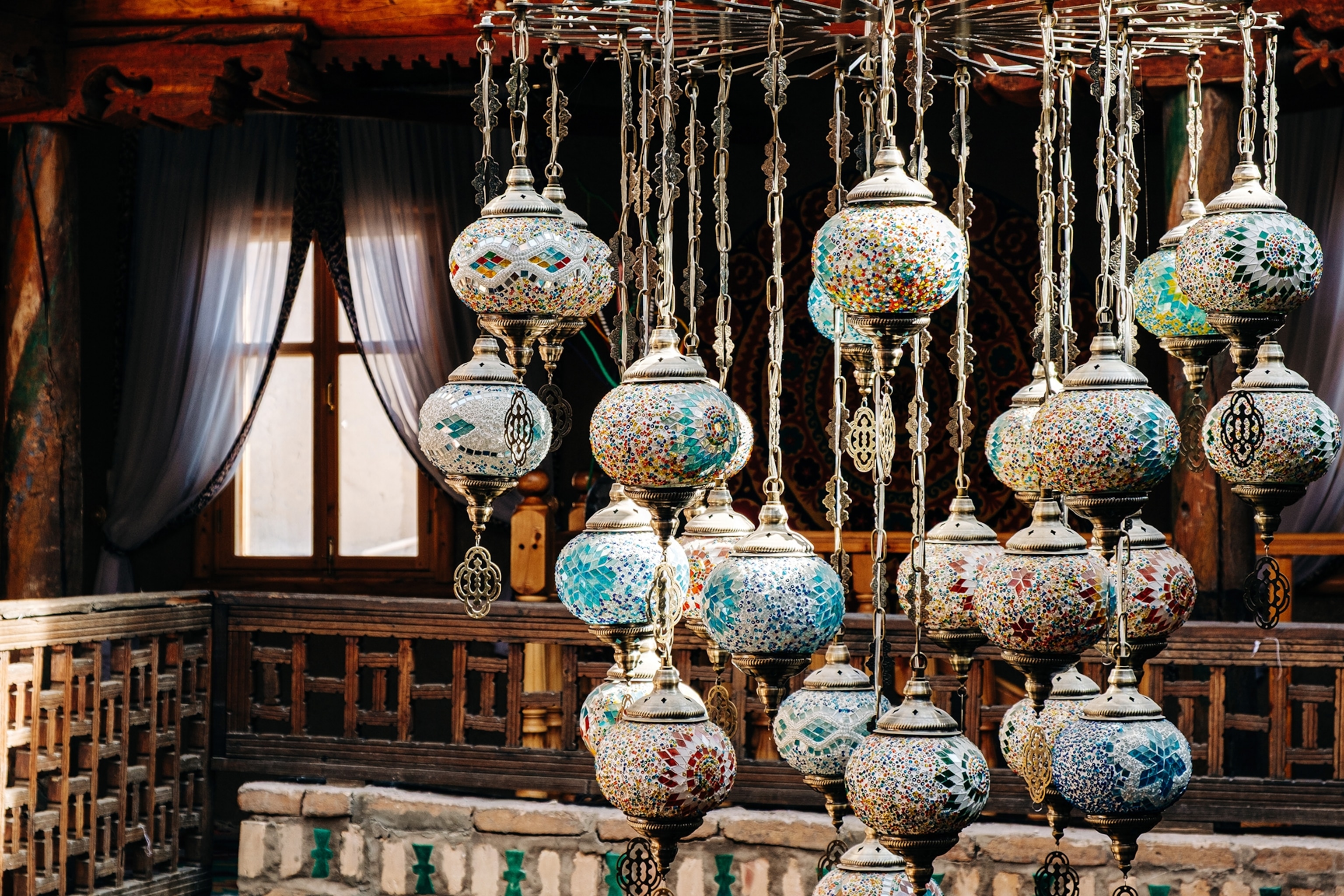 A wide shot taken in a traditional shop selling mosaic lanterns.