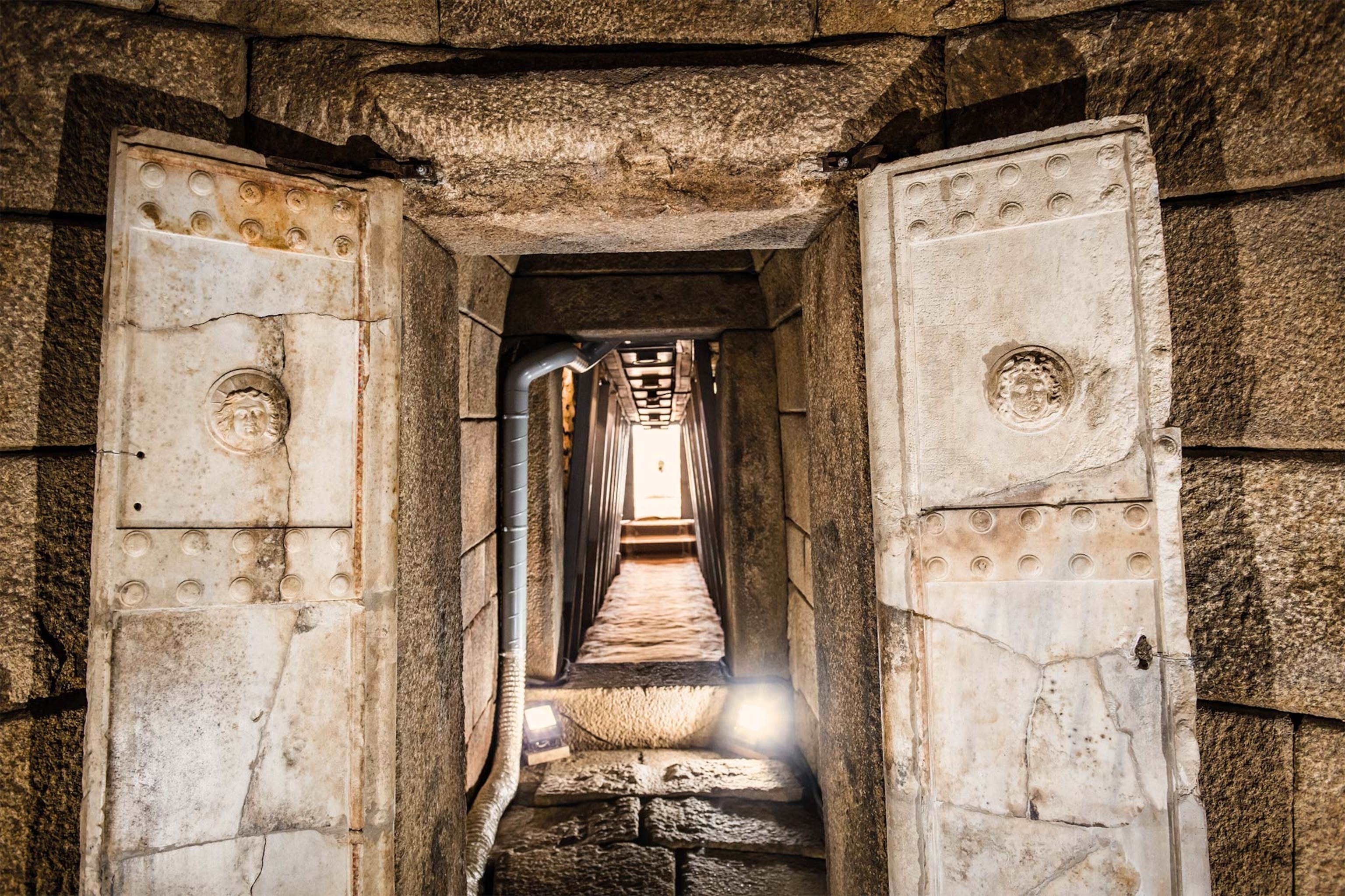 Shining into the hall leading to a central chamber, light illuminates a tomb found in 2004 under the mound of Golyamata Kosmatka, north of Kazanlak.