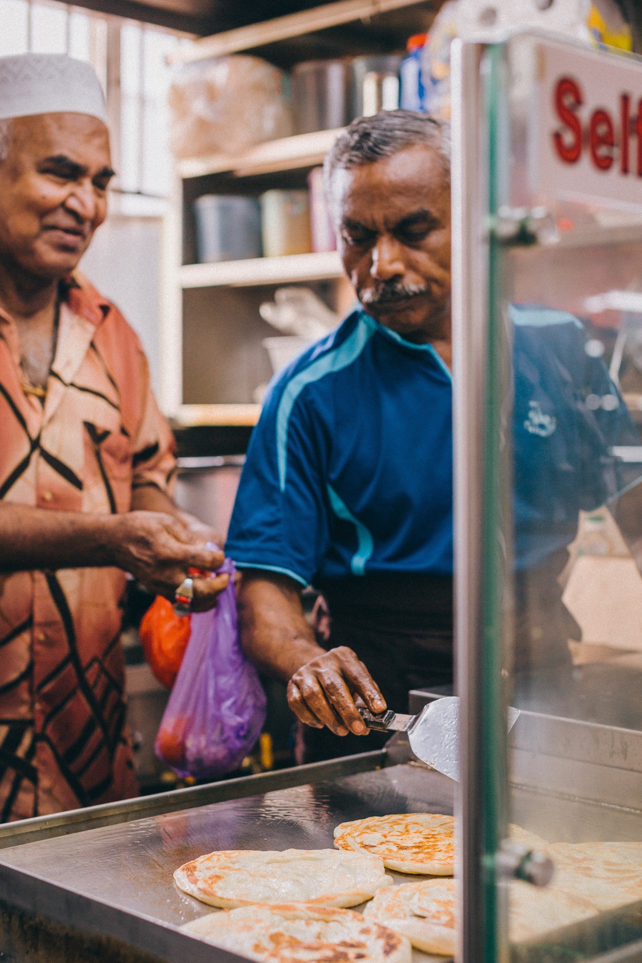 Making prata in Tekka Market in Little India.