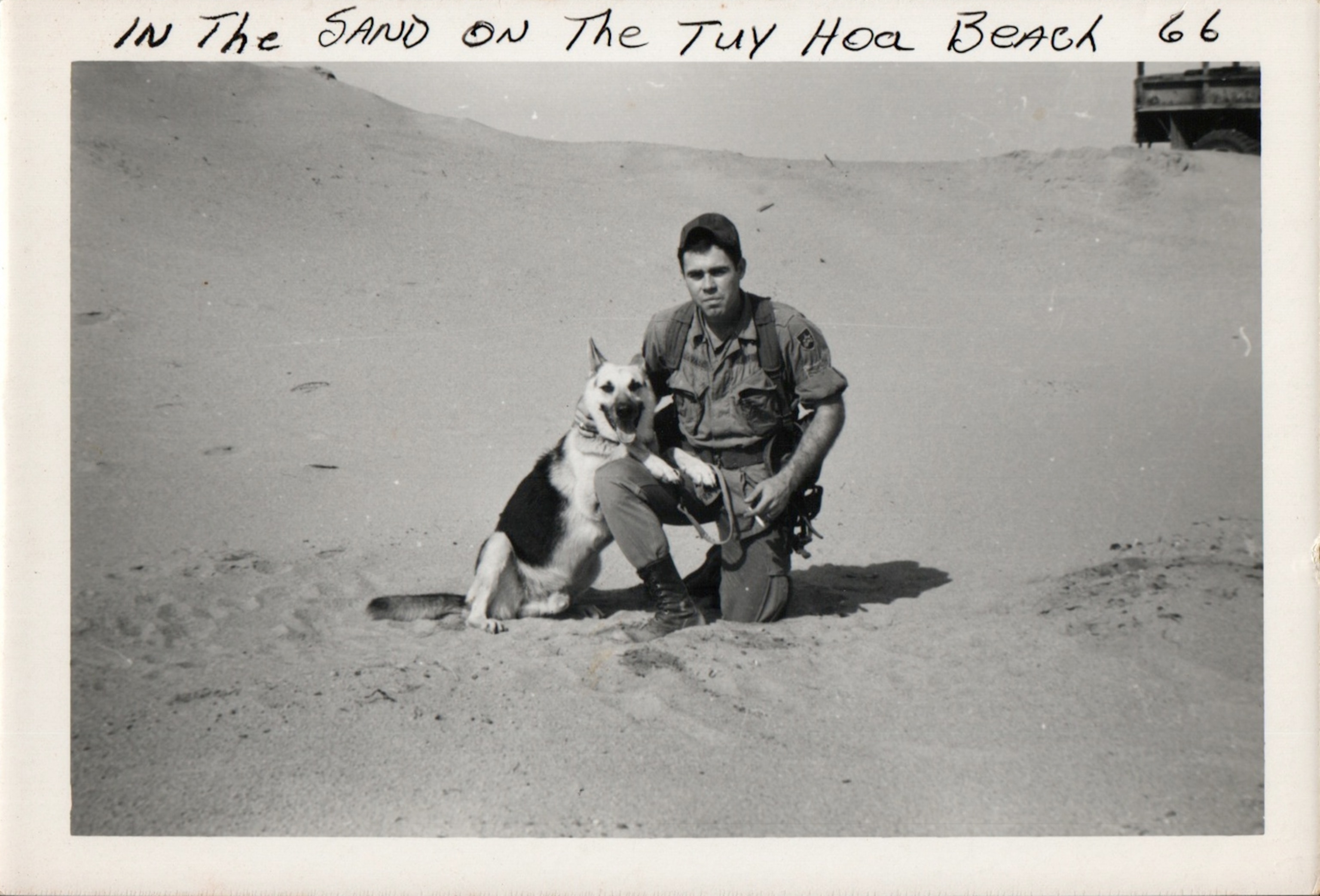 Phillip Savage, a sentry-dog handler with the U.S. Air Force, with a dog in 1966
