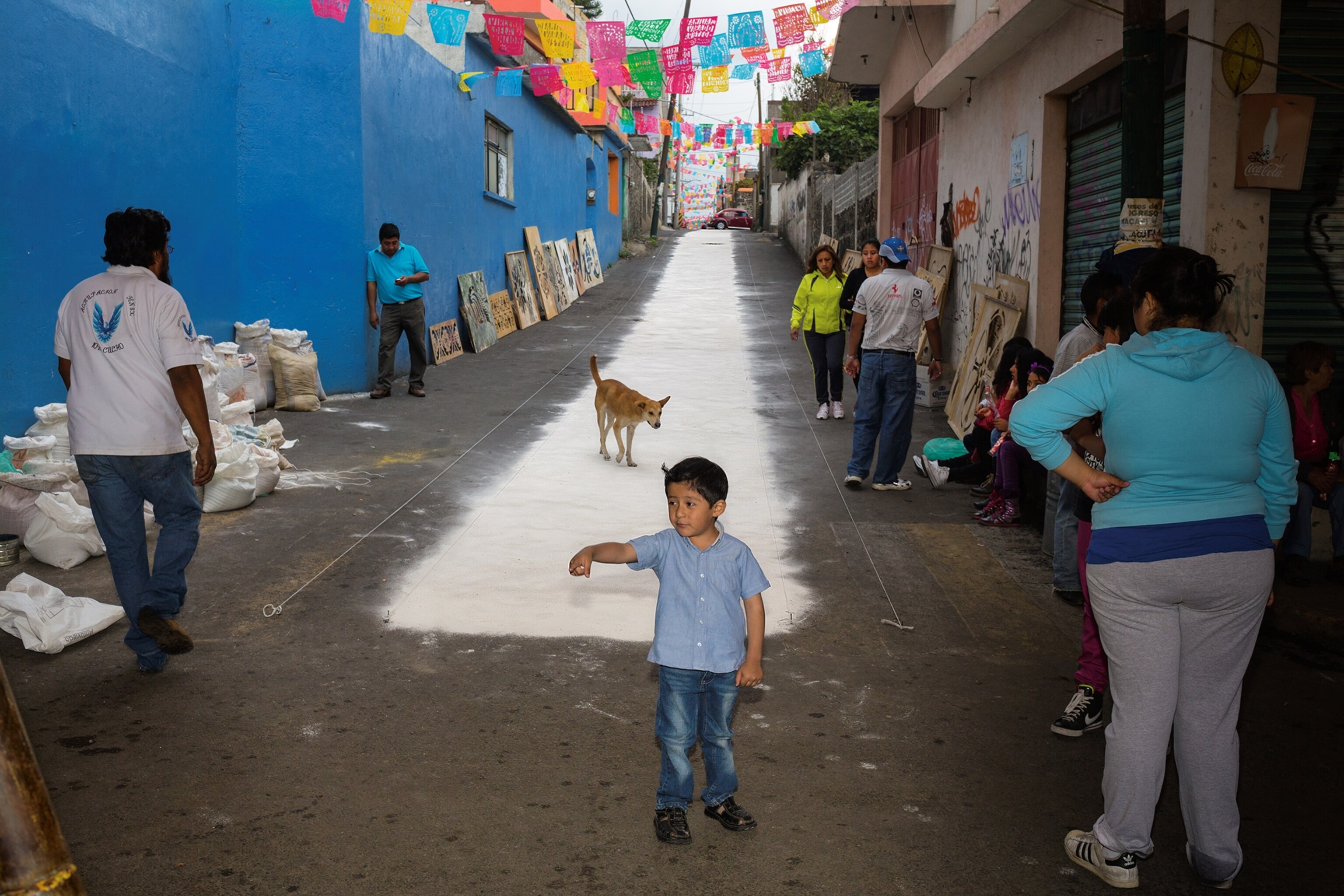 Decorative sand is strewn along a street in Milpa Alta to celebrate La Rejunta. Milpa Alta, Mexico.