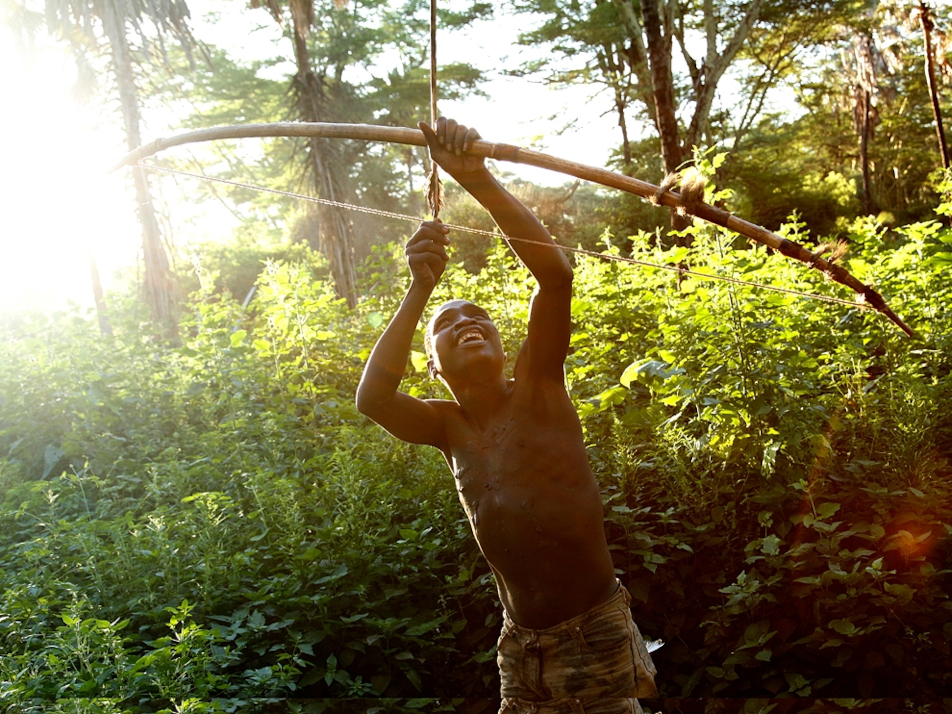 African bushman shooting arrow