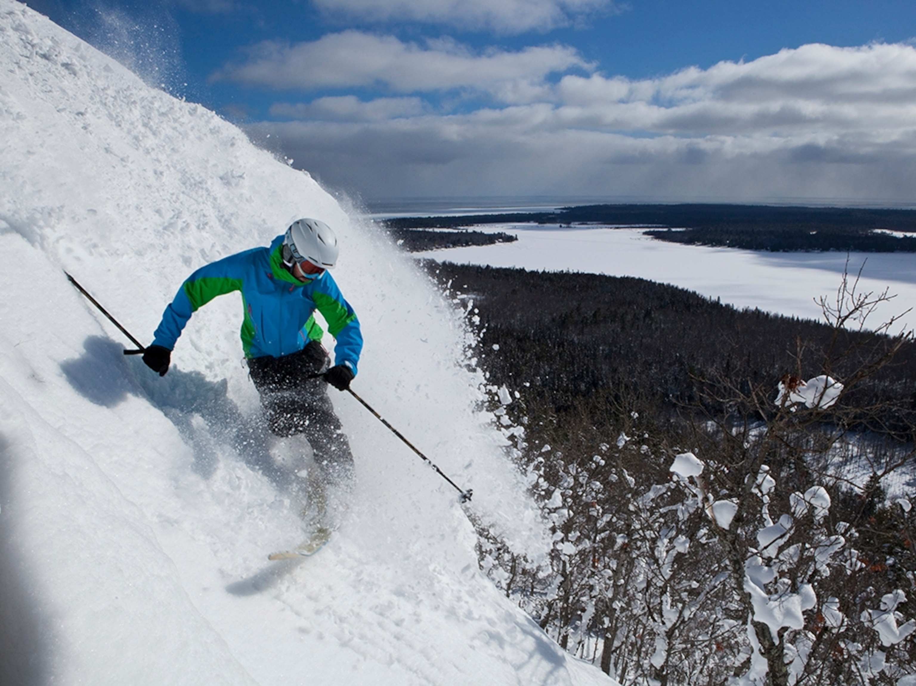 a man skiing down "Slide Path" on Mount Bohemia, Michigan