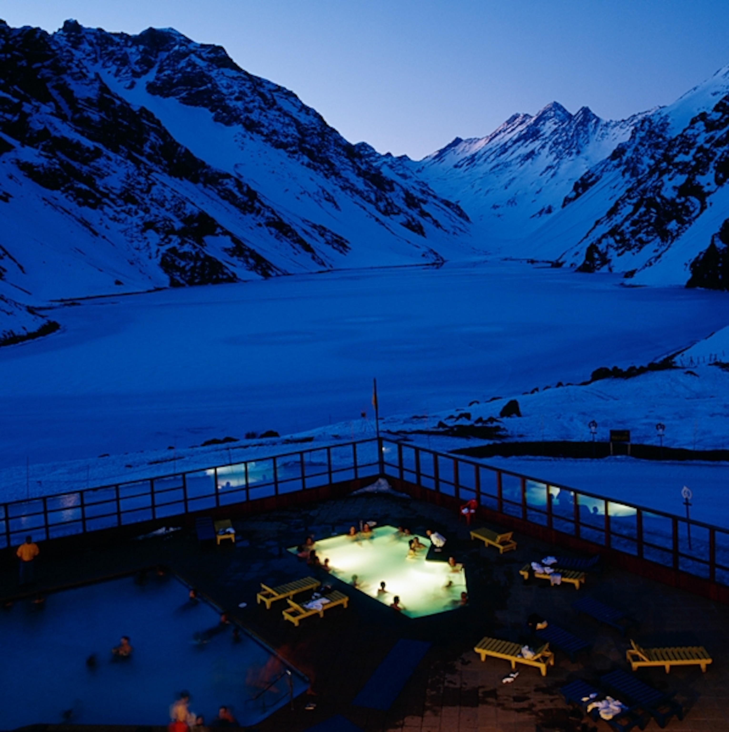 a swimming pool outside Portillo ski resort at dusk, Chile
