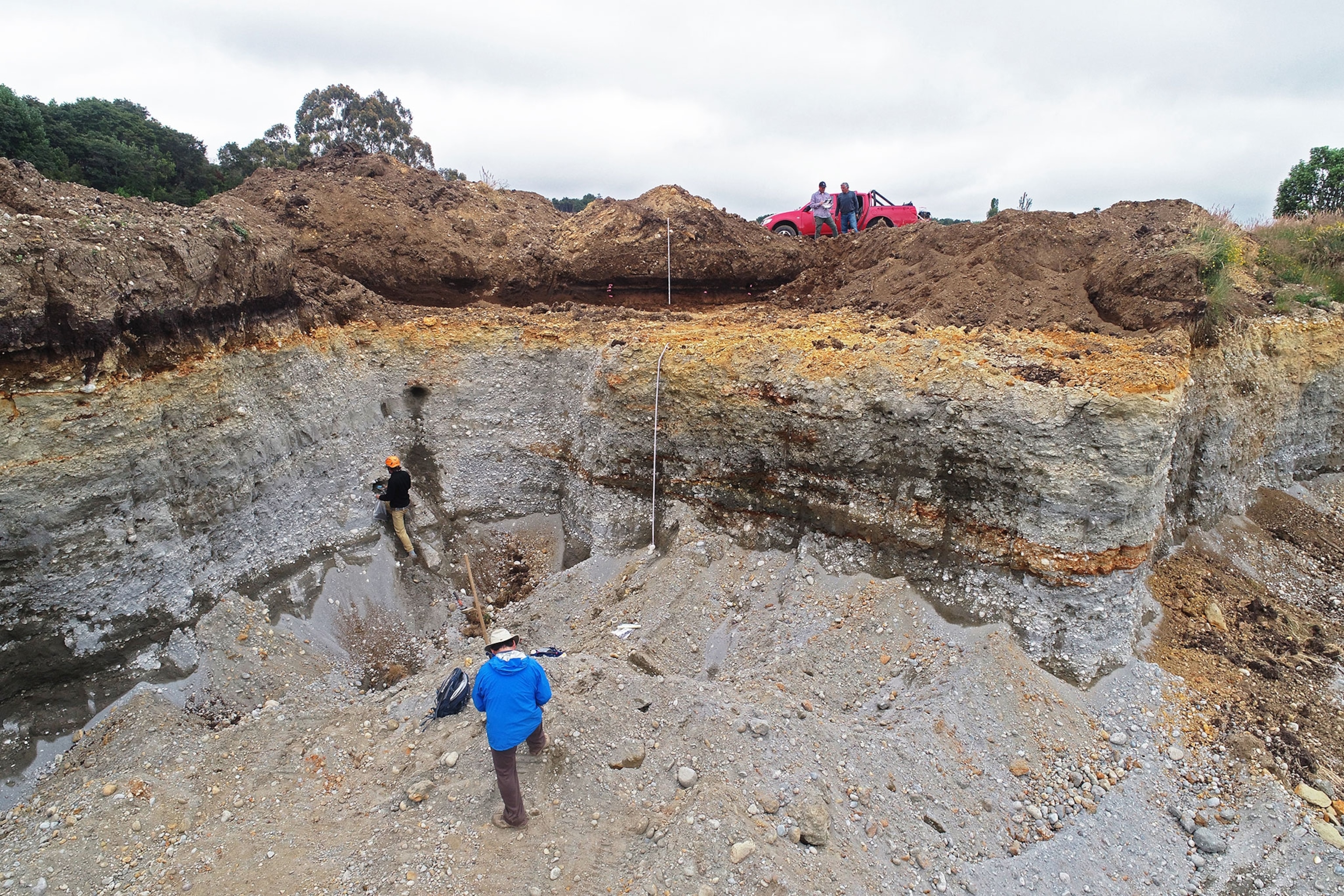 Juan-Luis García, and Claudio Latorre collecting an OSL sample from Section 1.