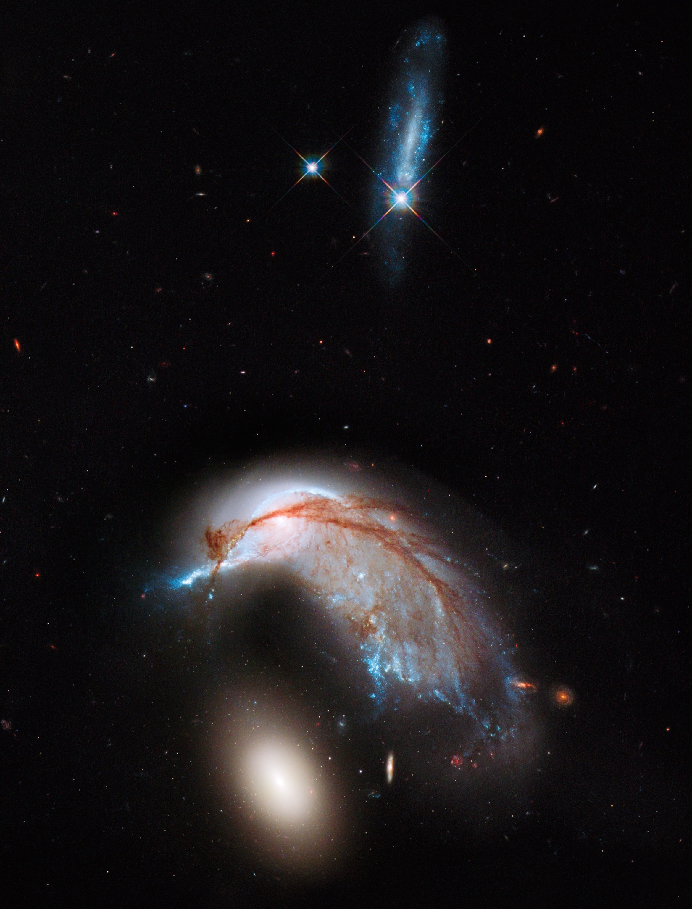 Week in Space 250 - Picture of two galaxies colliding such that they look like a penguin guarding its egg