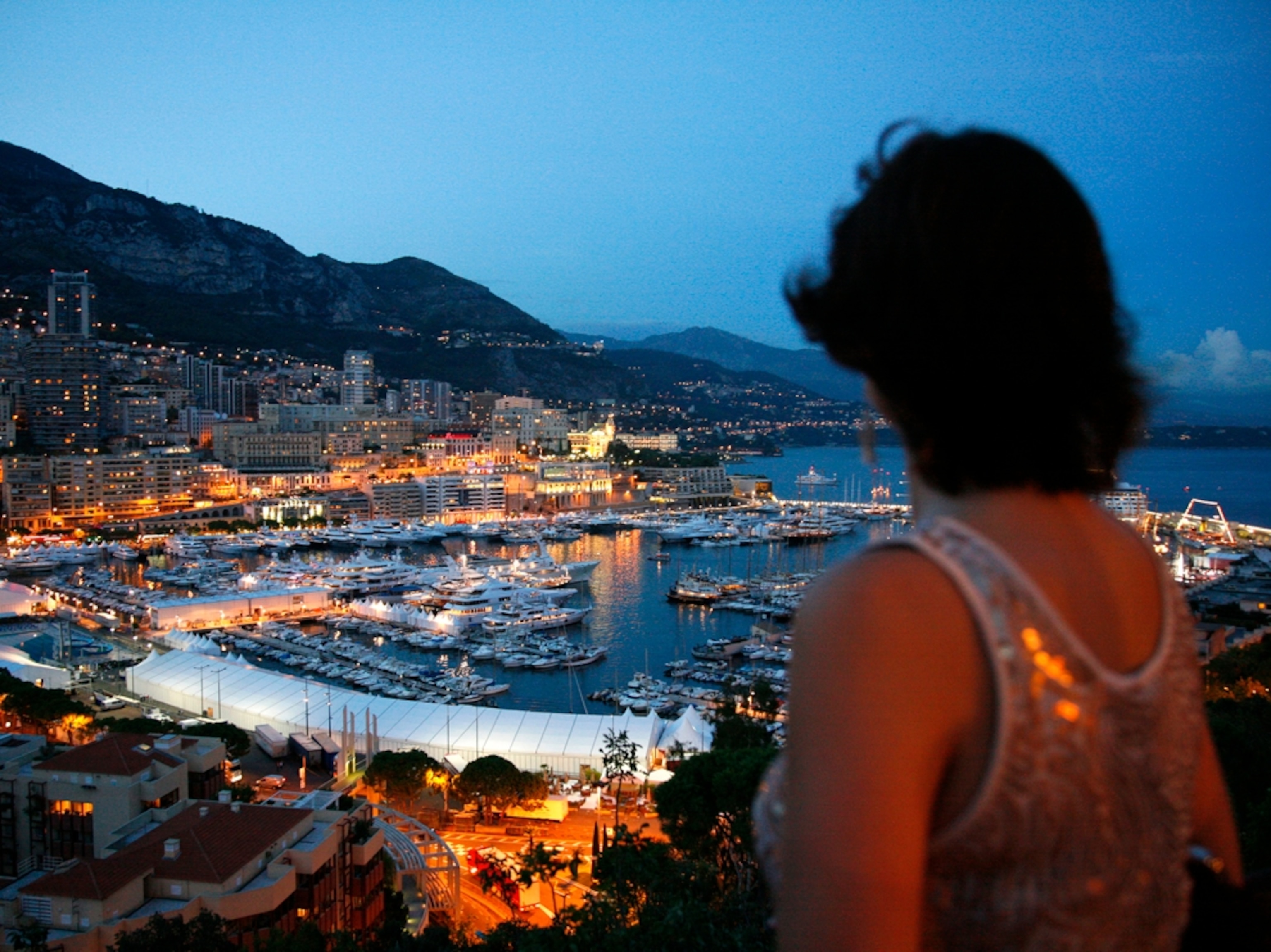 a woman looking out over Monte Carlo, Monaco.