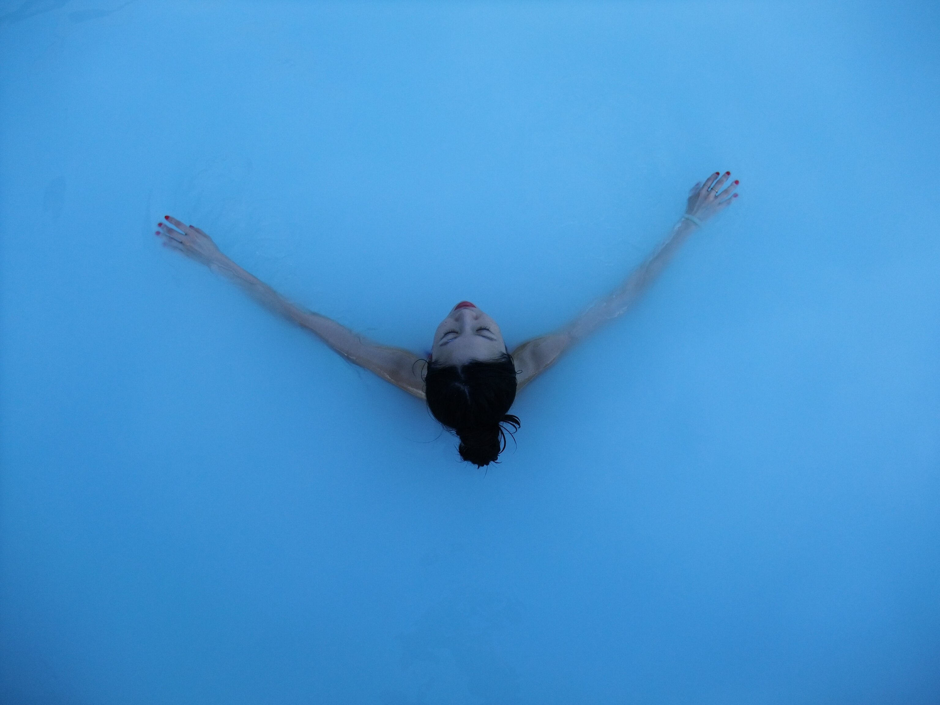 a woman relaxing in a hot spring