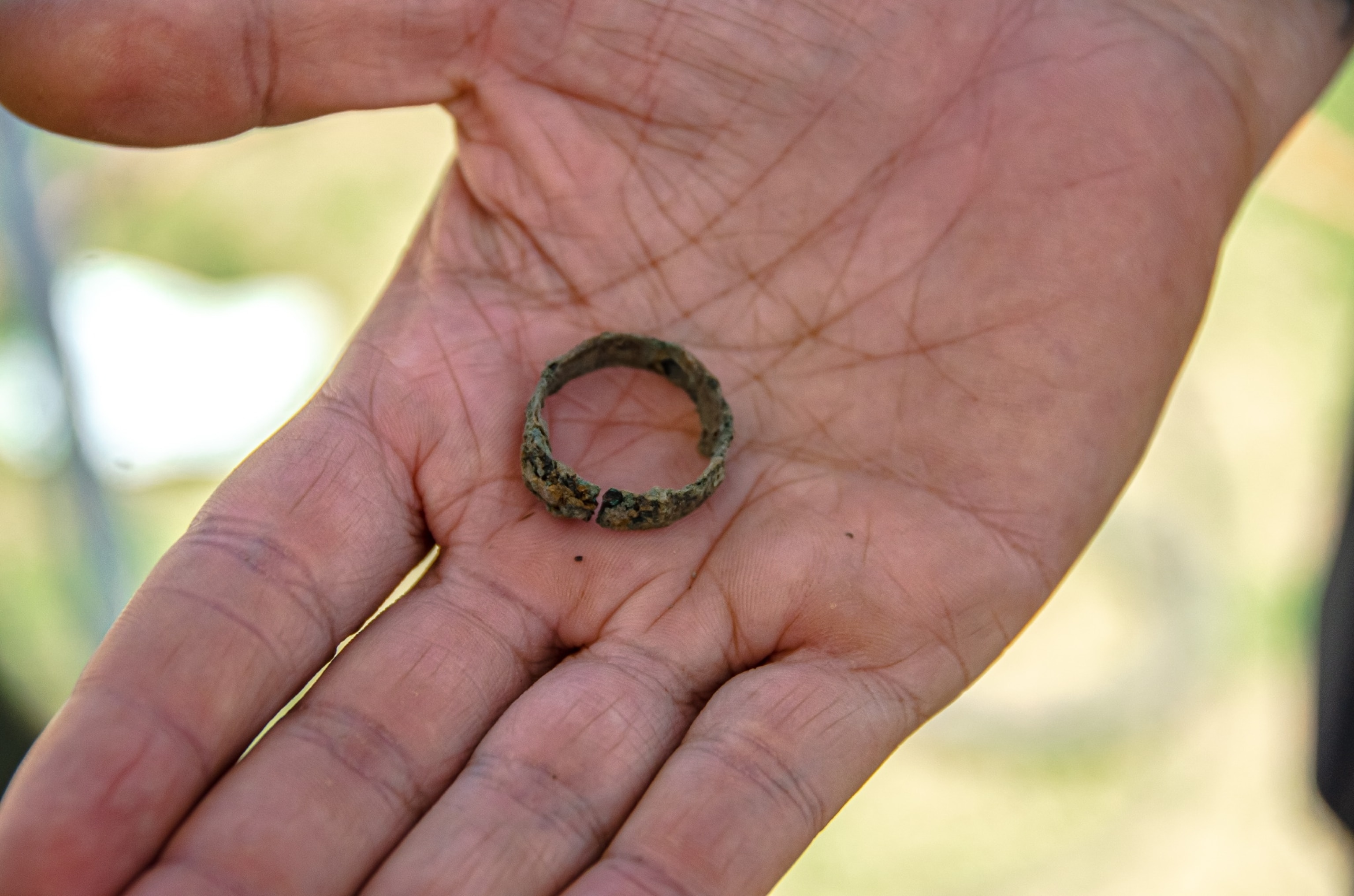 rusted artifact in a had