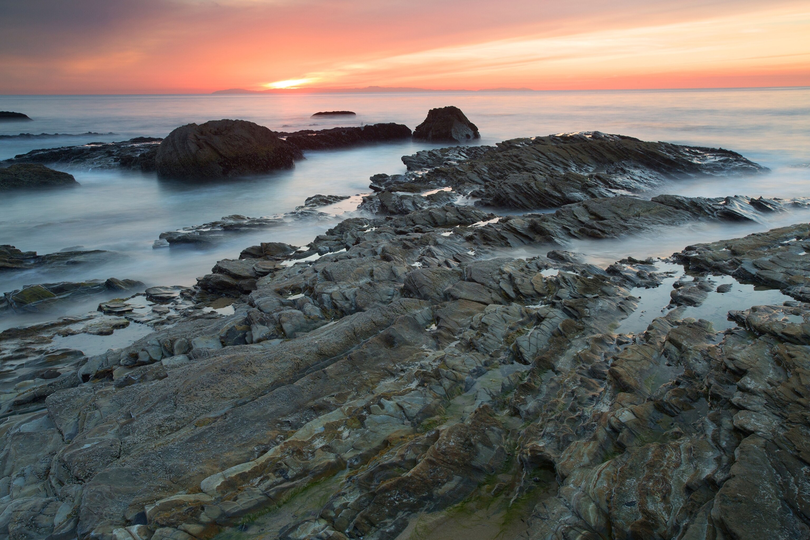 sunset at Crystal Cove State Park in Newport Beach, California