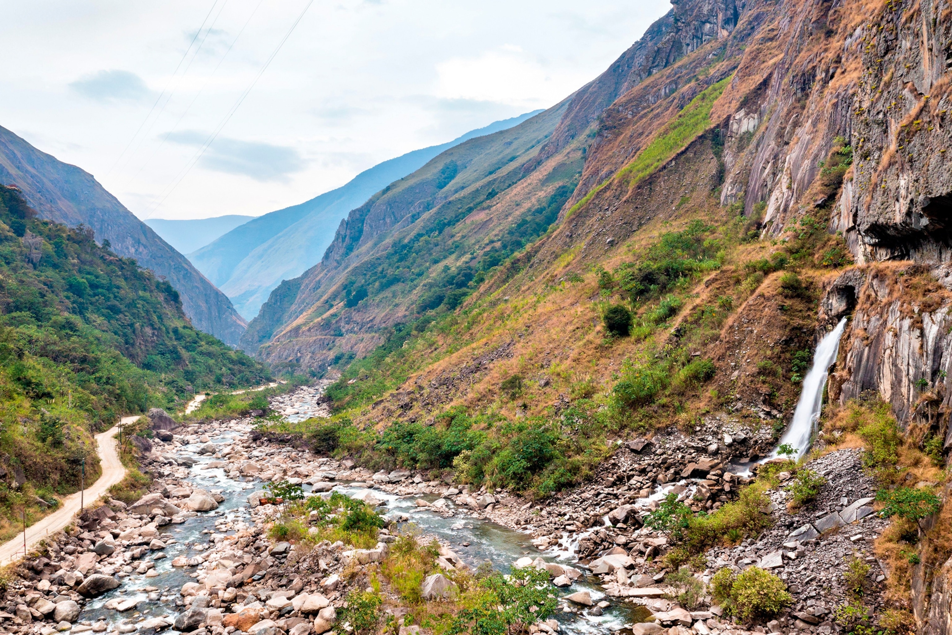 A riverbed snaking through a mountain valley in Peru.