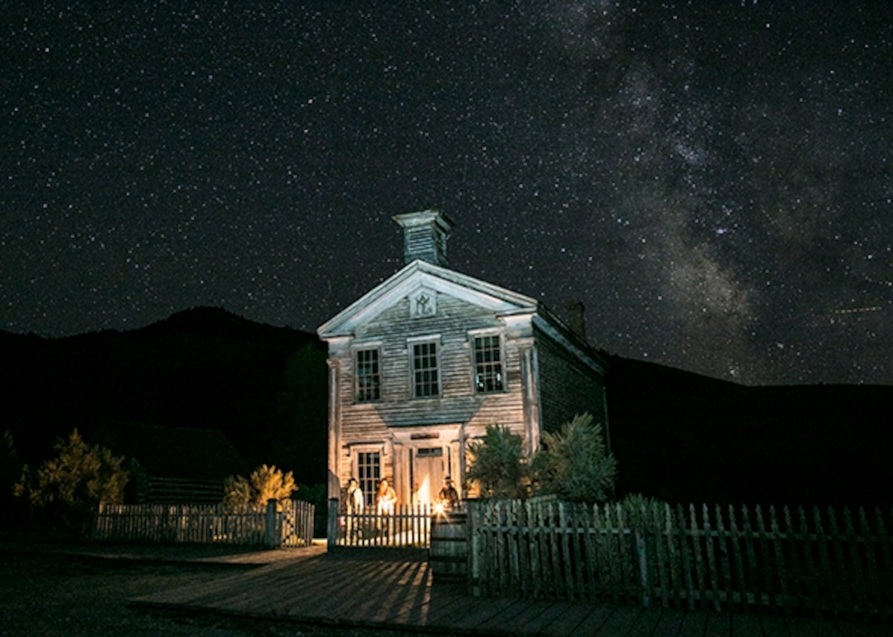 The Milky Way over one of the mid-19th-century buildings that remain in Bannack State Park (Photograph by Tyler Metcalfe)