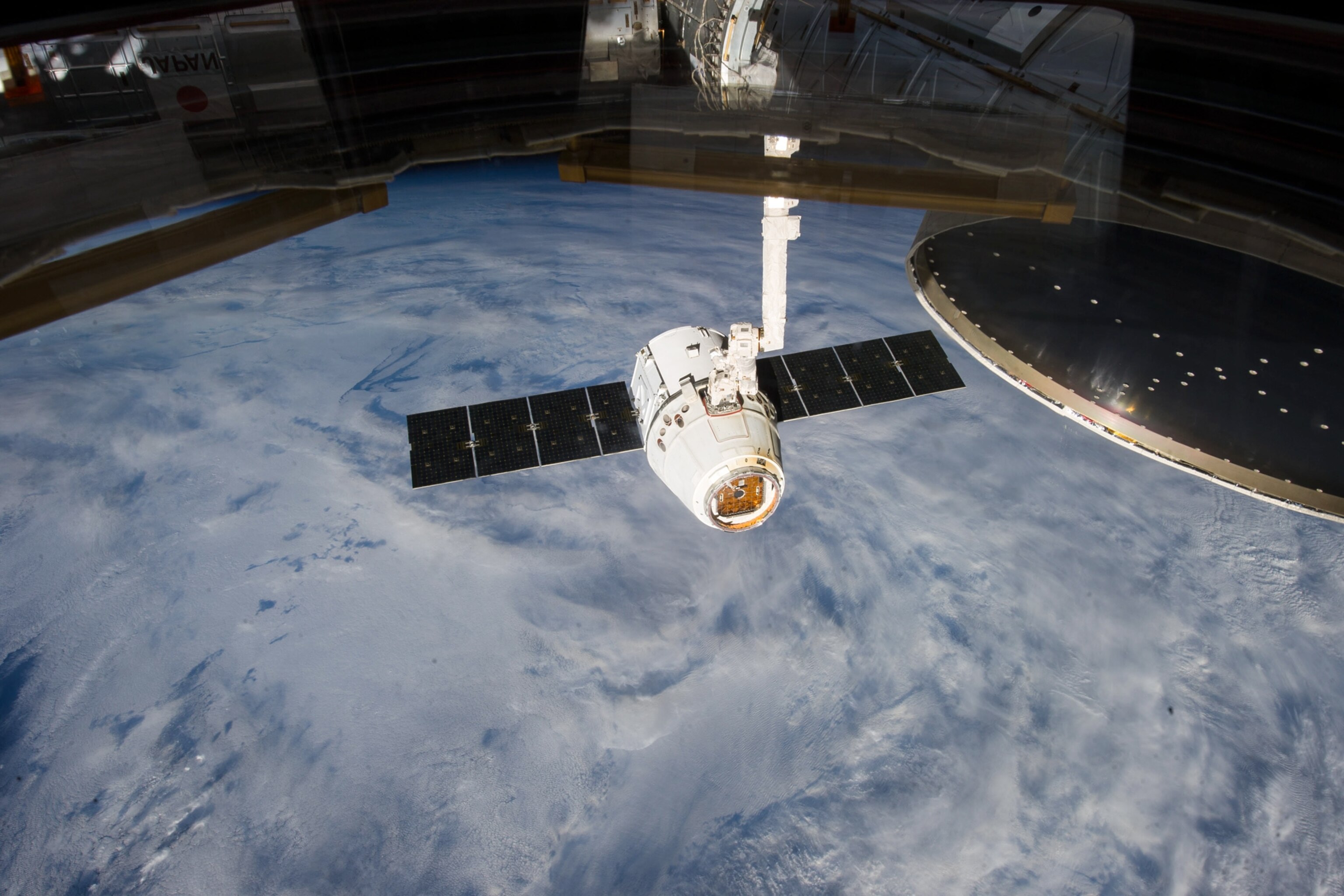 a SpaceX Dragon spacecraft detaching from the International Space Station