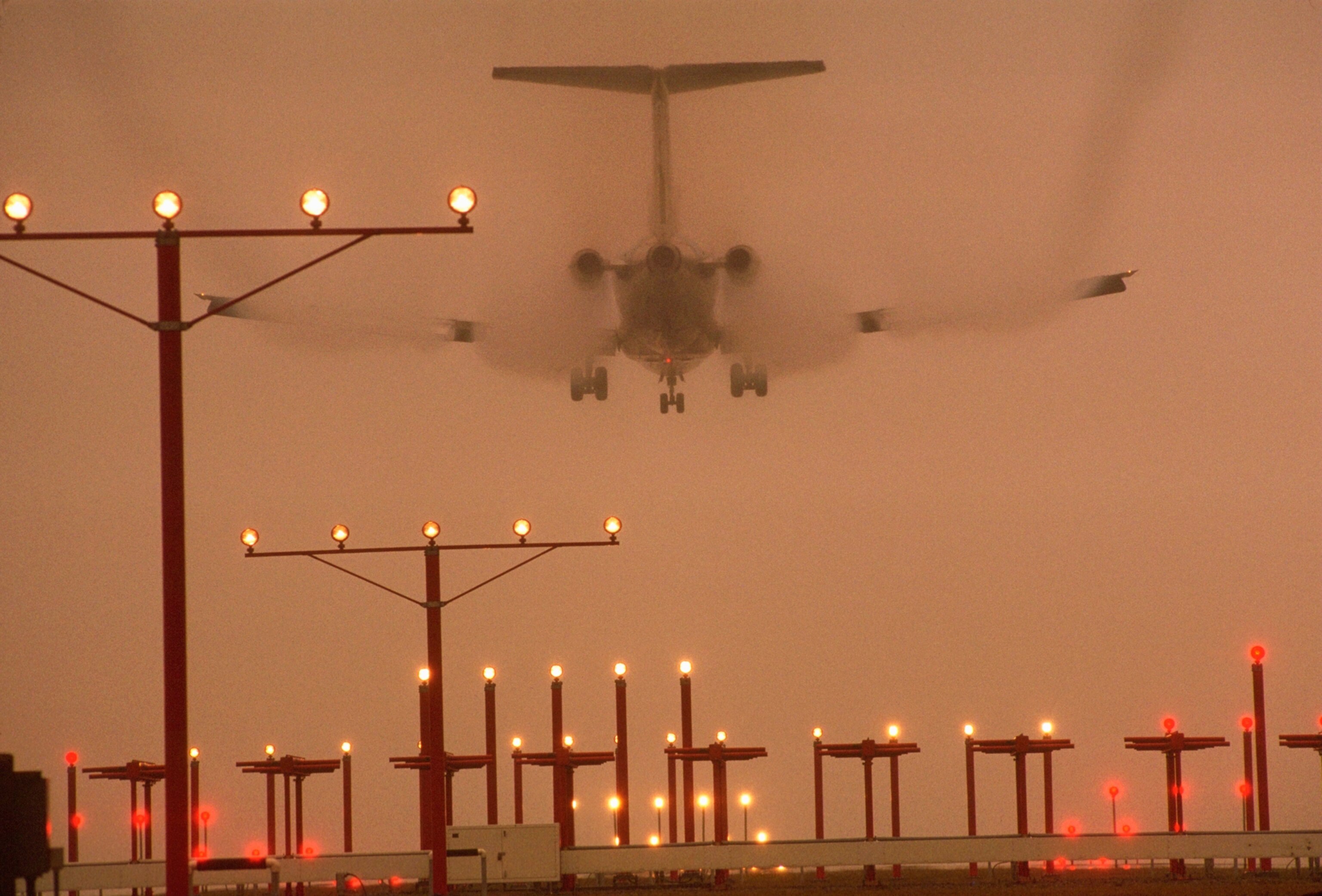 Plane Landing on Runway