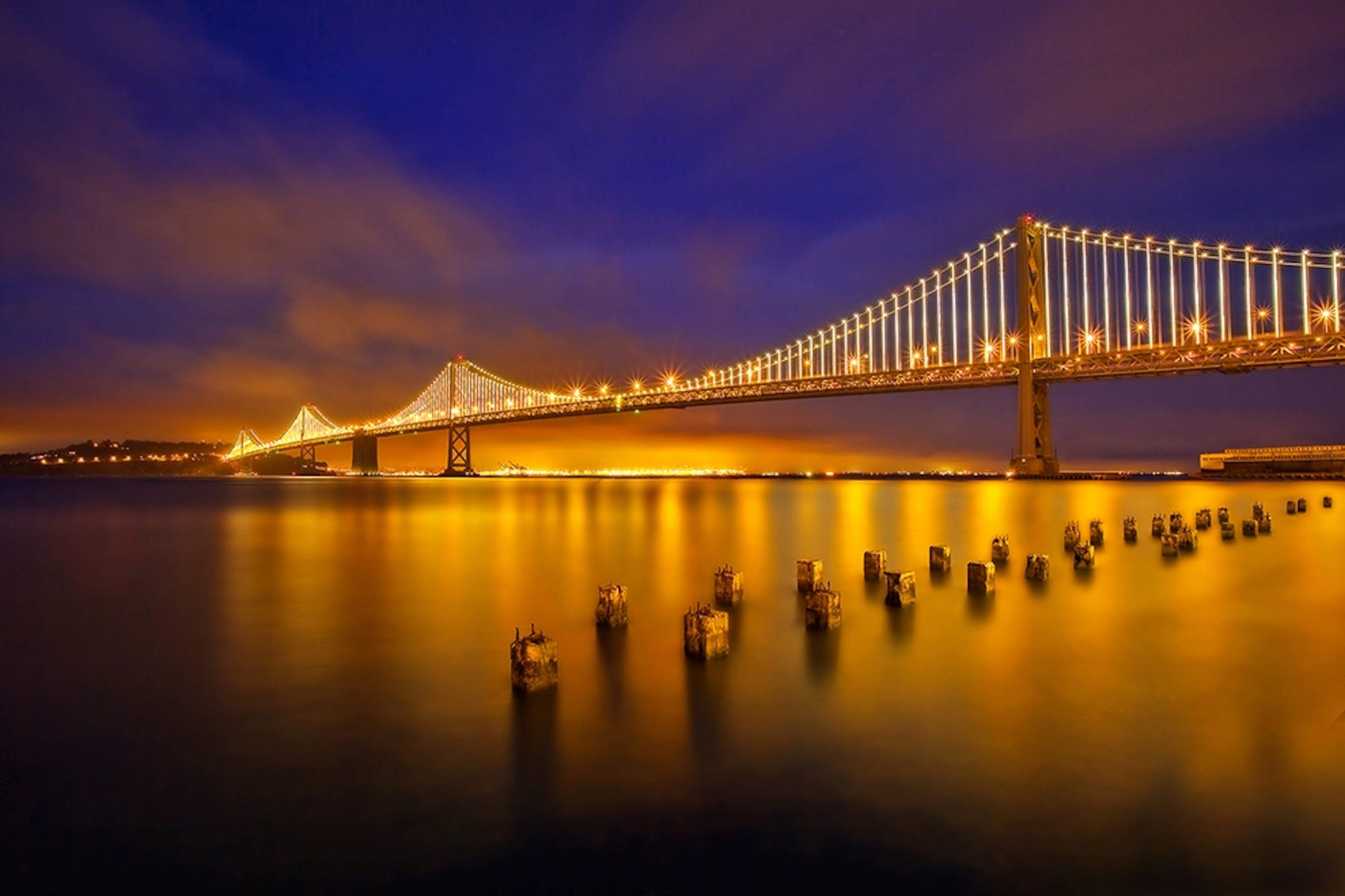the San Francisco-Oakland Bay Bridge at night