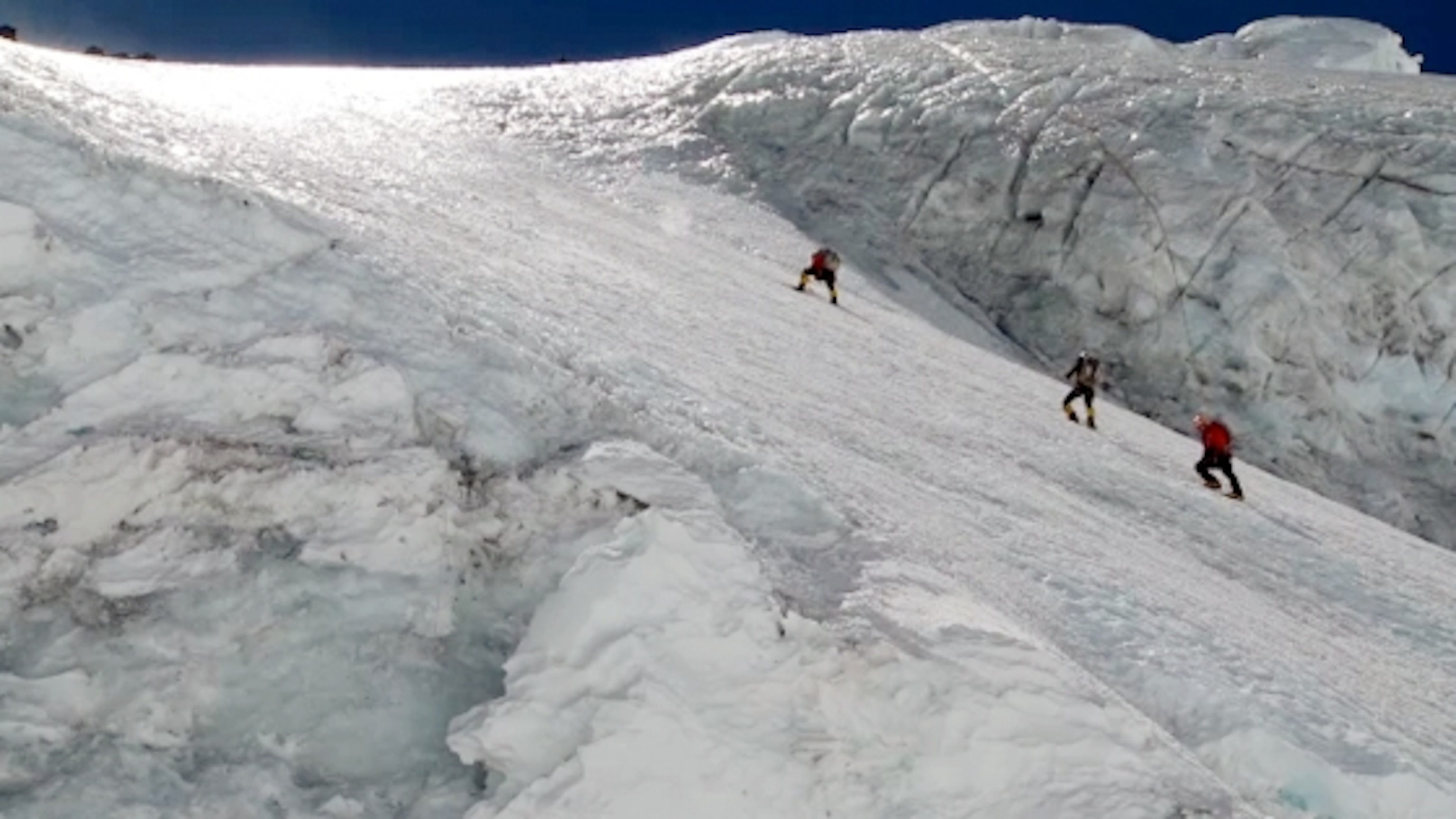 Climbers on an icy path on Everest