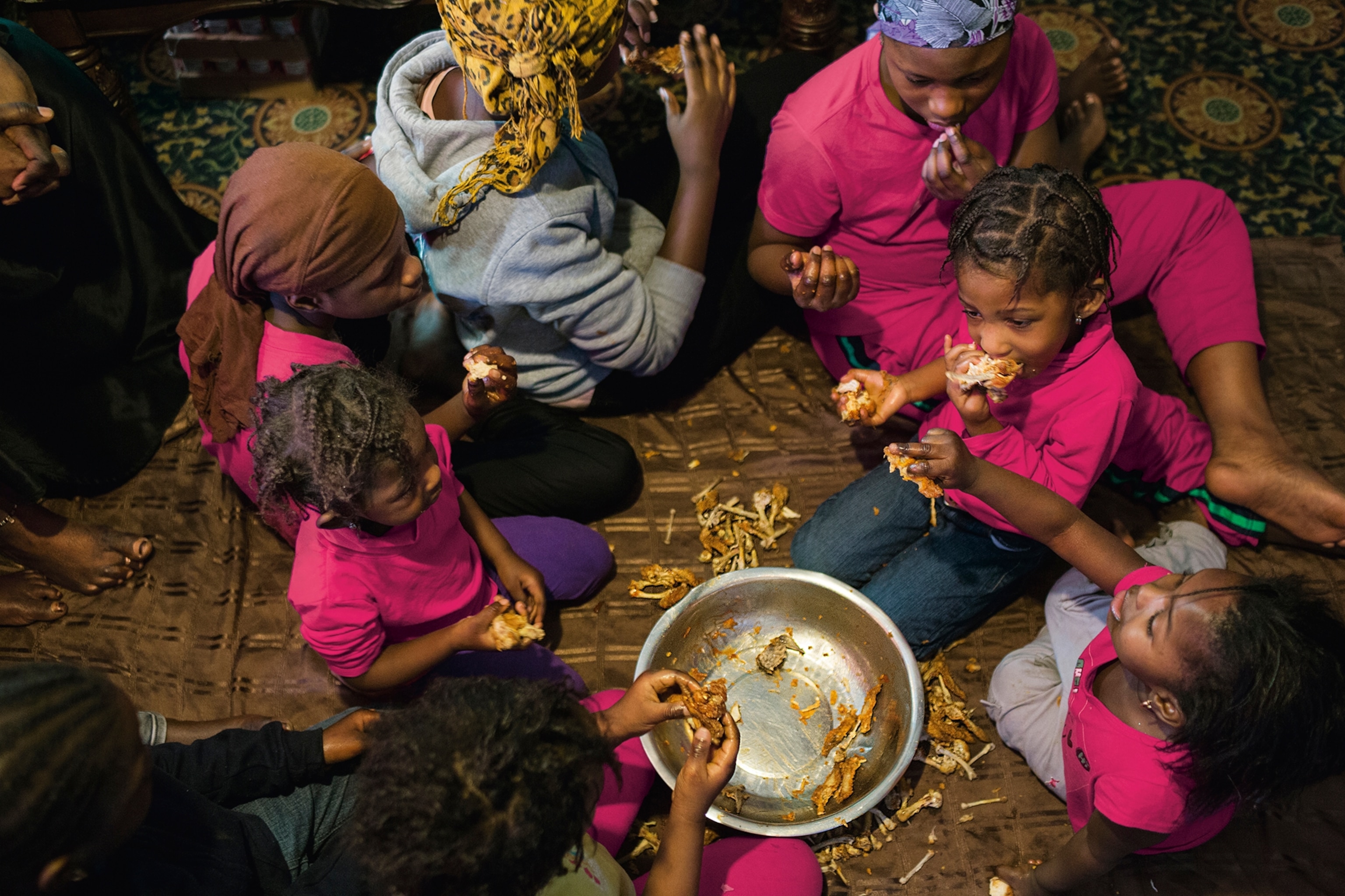 Hullamatou Ceesay, 31, mother of nine children, prepares and shops for food for or her family.