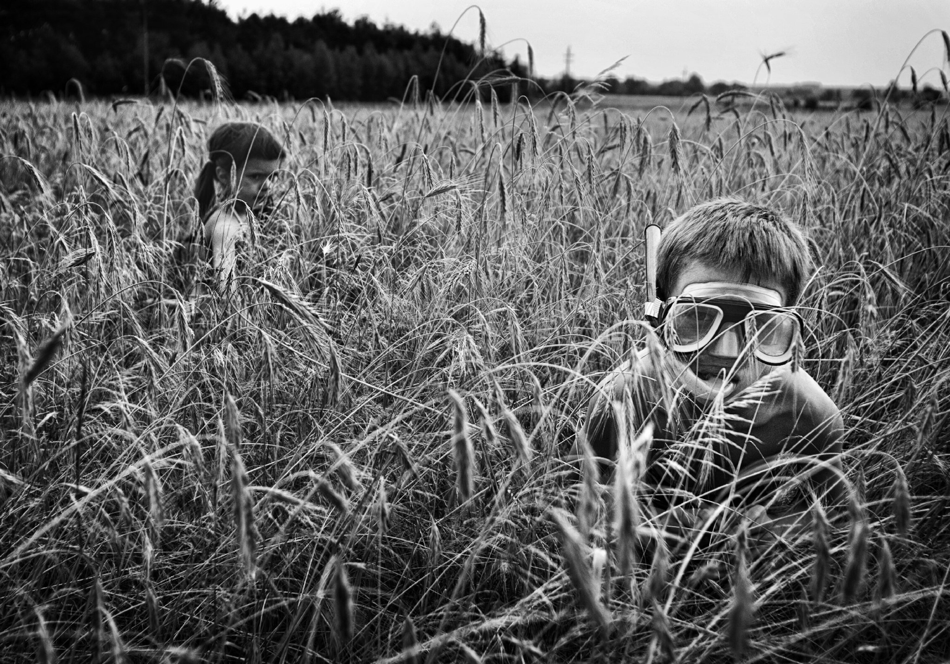 boy and girl goggles field