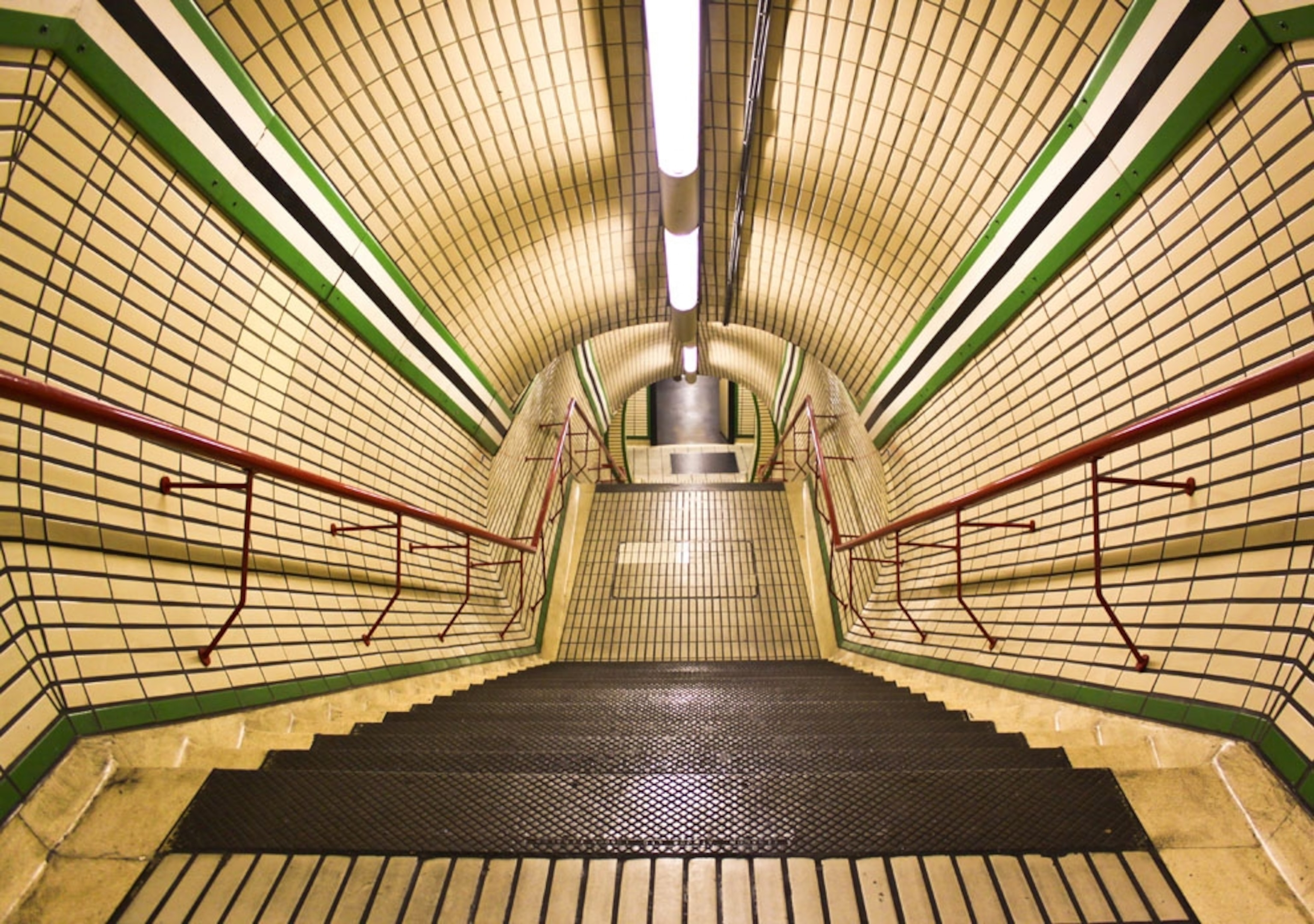 Steep stairs leading down into London's Tottenham tube station