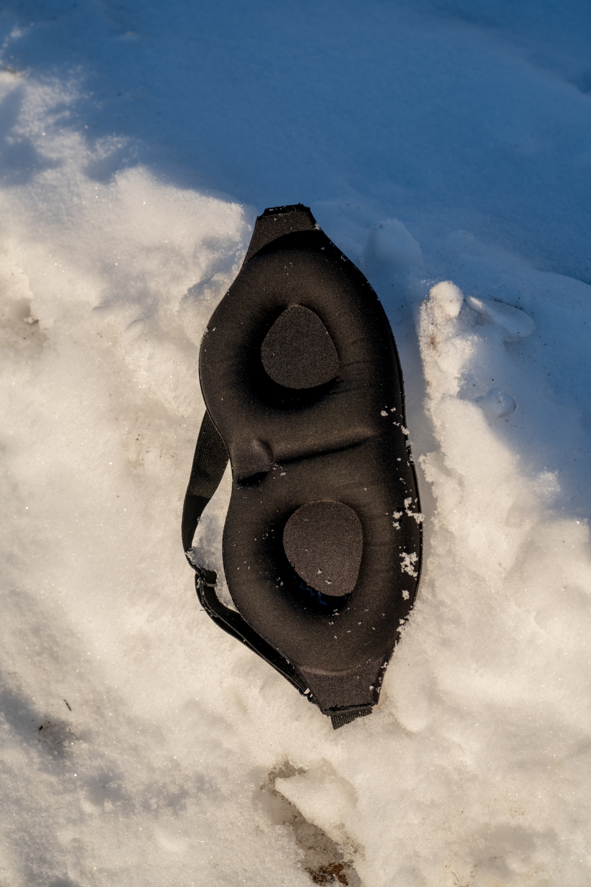 an eyemask worn by a person who has sensitivity to light