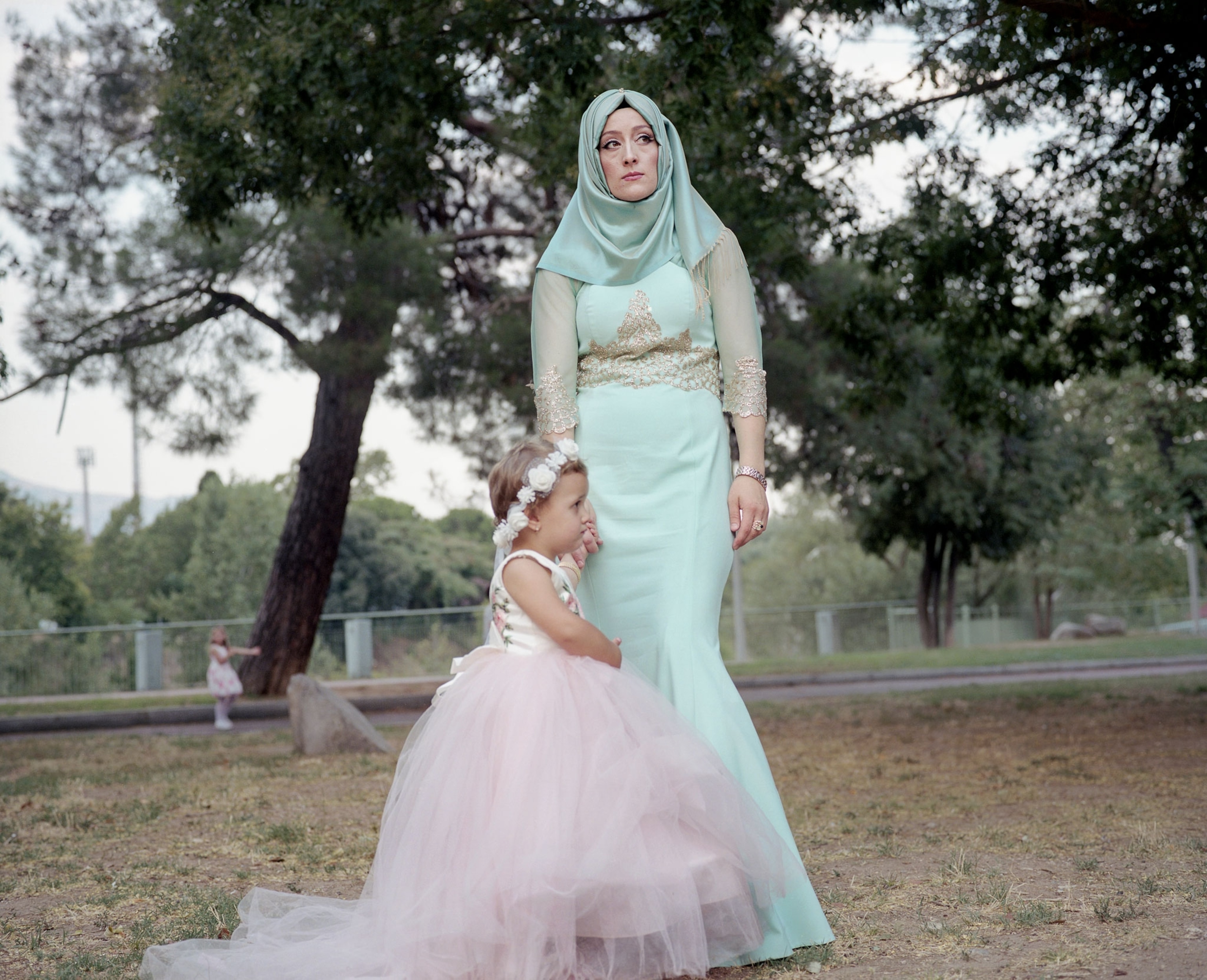 a Pomak woman and child after a wedding