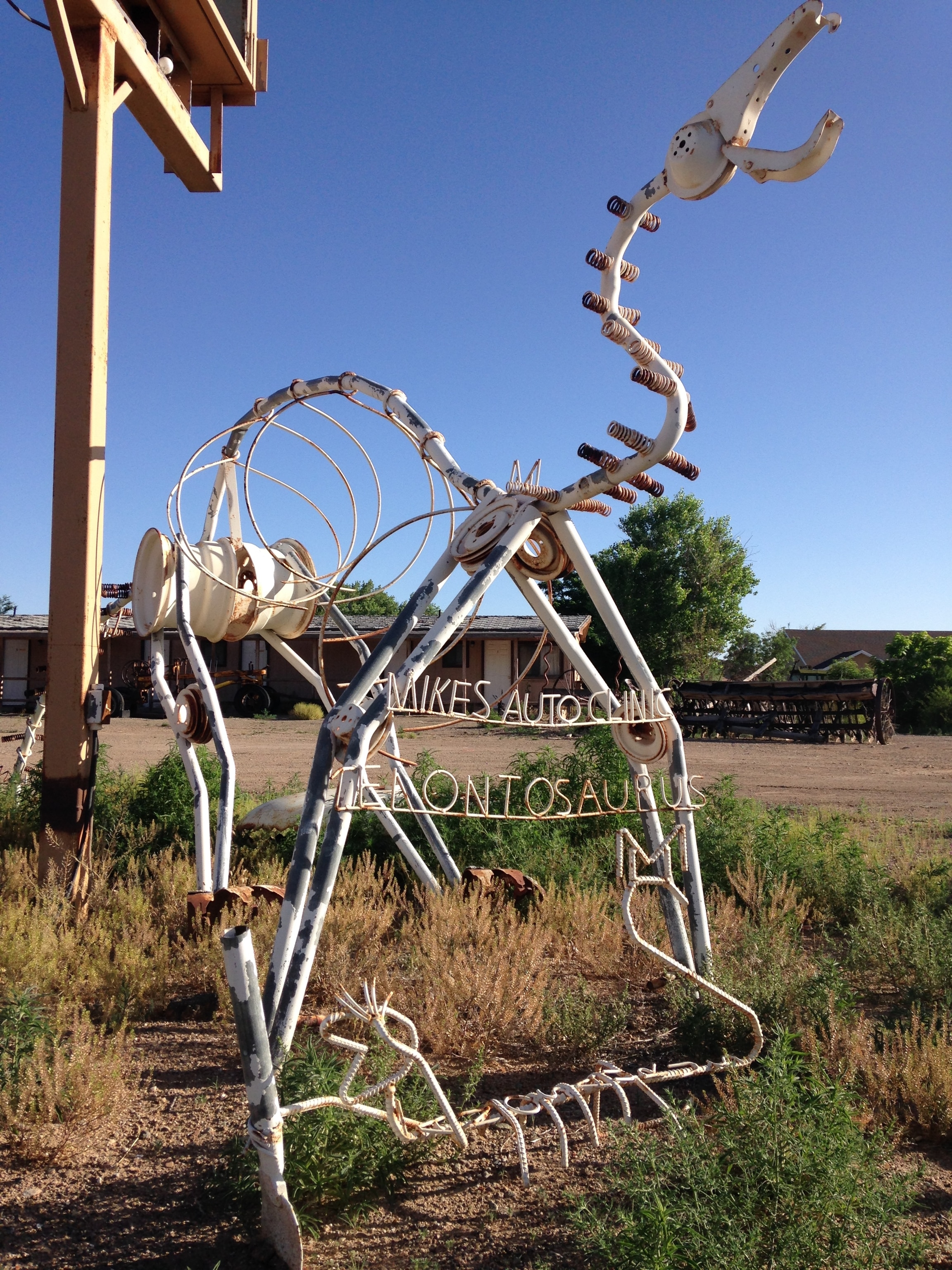 A junkyard dinosaur on Hanksville's main drag. Photo by Brian Switek.