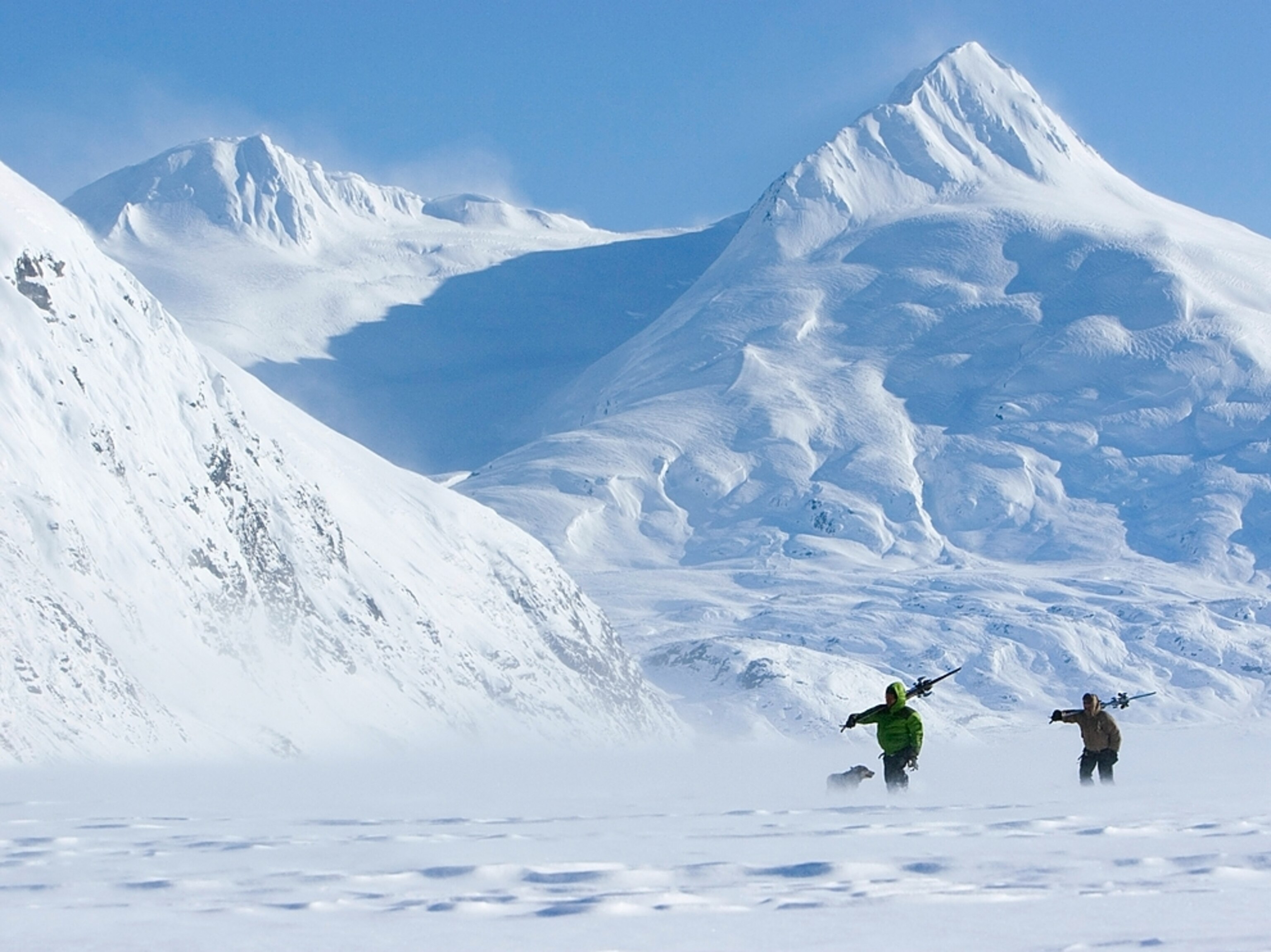 two skiers walking on Portage Lake, Alaska