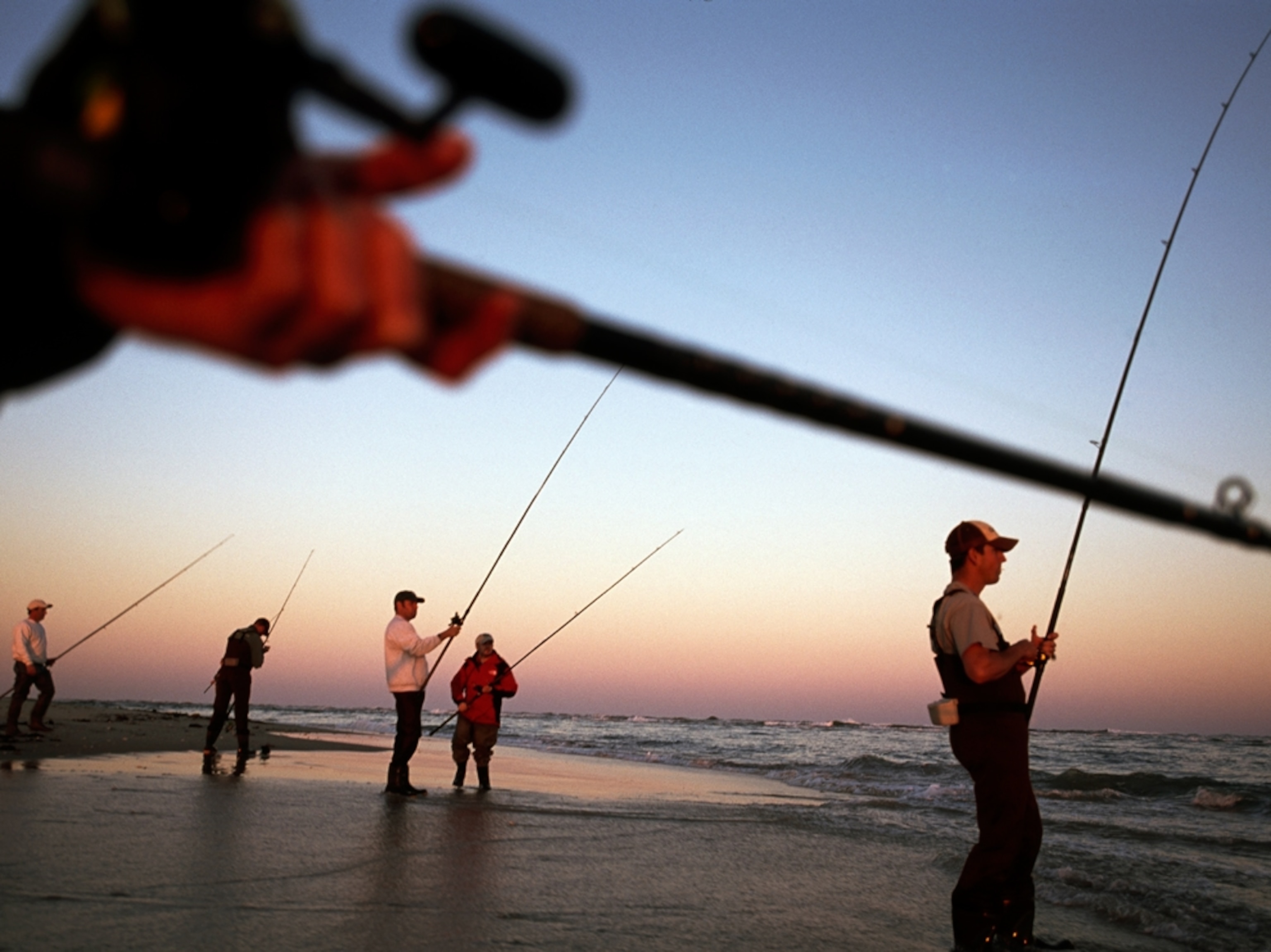 fishermen on North Carolina beach