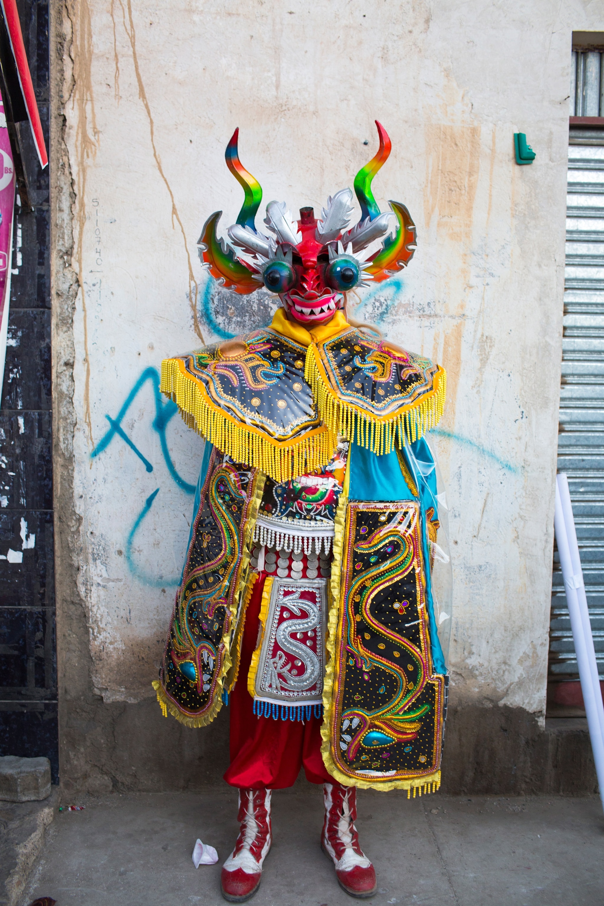 a man in a traditional devil costume in El Alto, Bolivia