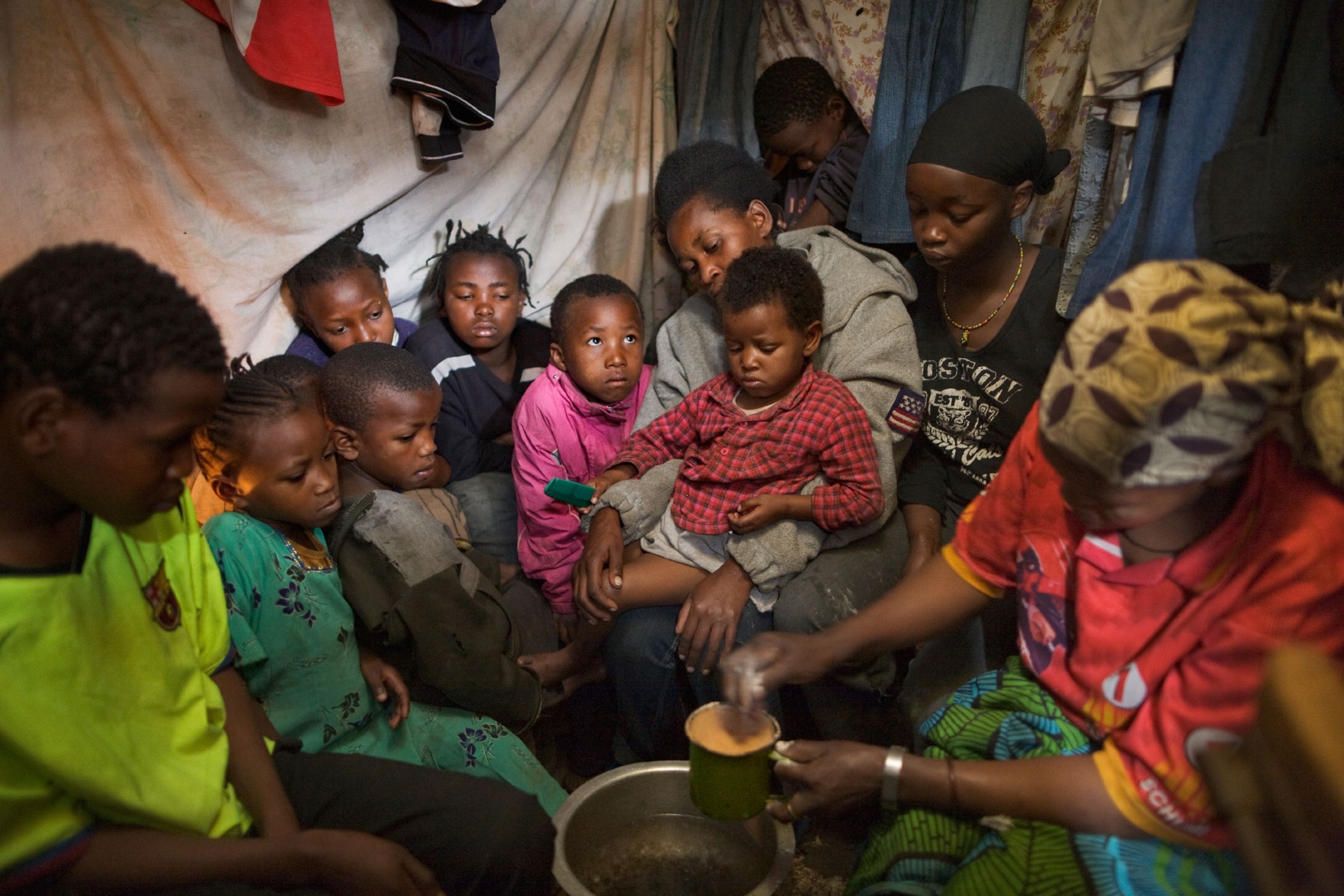 a mother in Nairobi feeding 10 people
