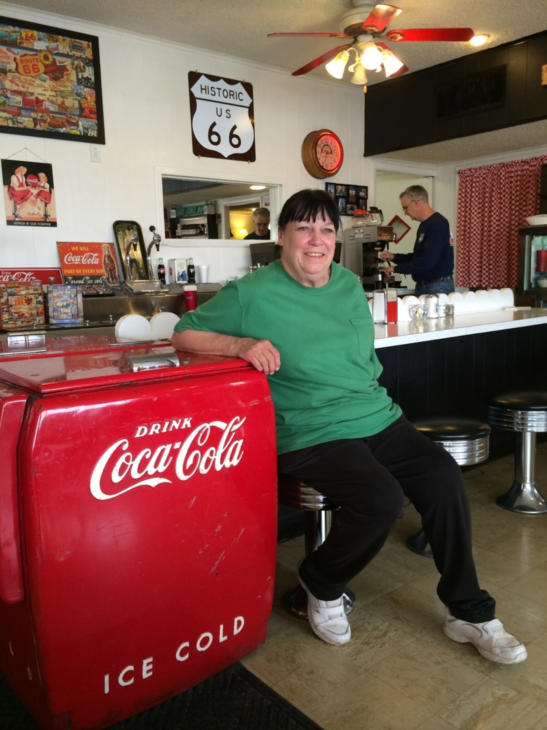 Staff at the MidPoint Cafe take a break after the lunchtime rush in Adrian, Texas. "We get people here from all over the world." (Photo by Andrew Evans, National Geographic Travel)