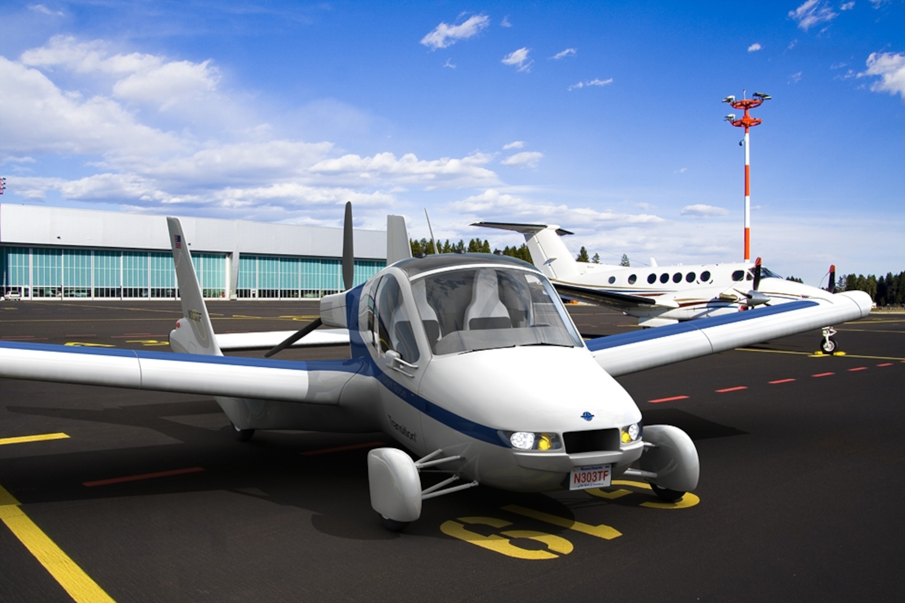 the Terrafugia Transition flying car (or roadable aircraft) on an airport tarmac