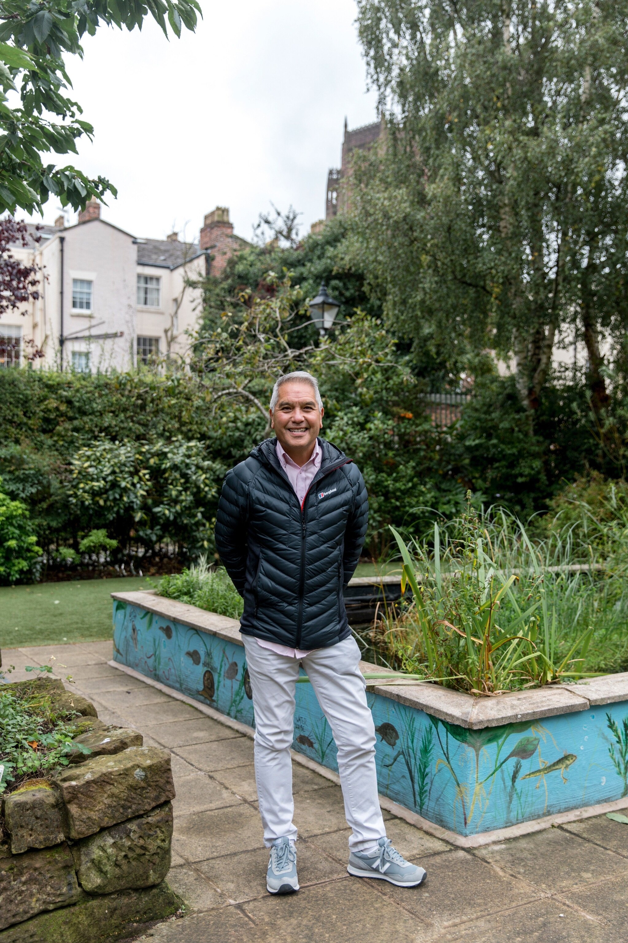Portrait of Stephen Yip at the headquarters of his children’s charity, KIND, in the Georgian Quarter.