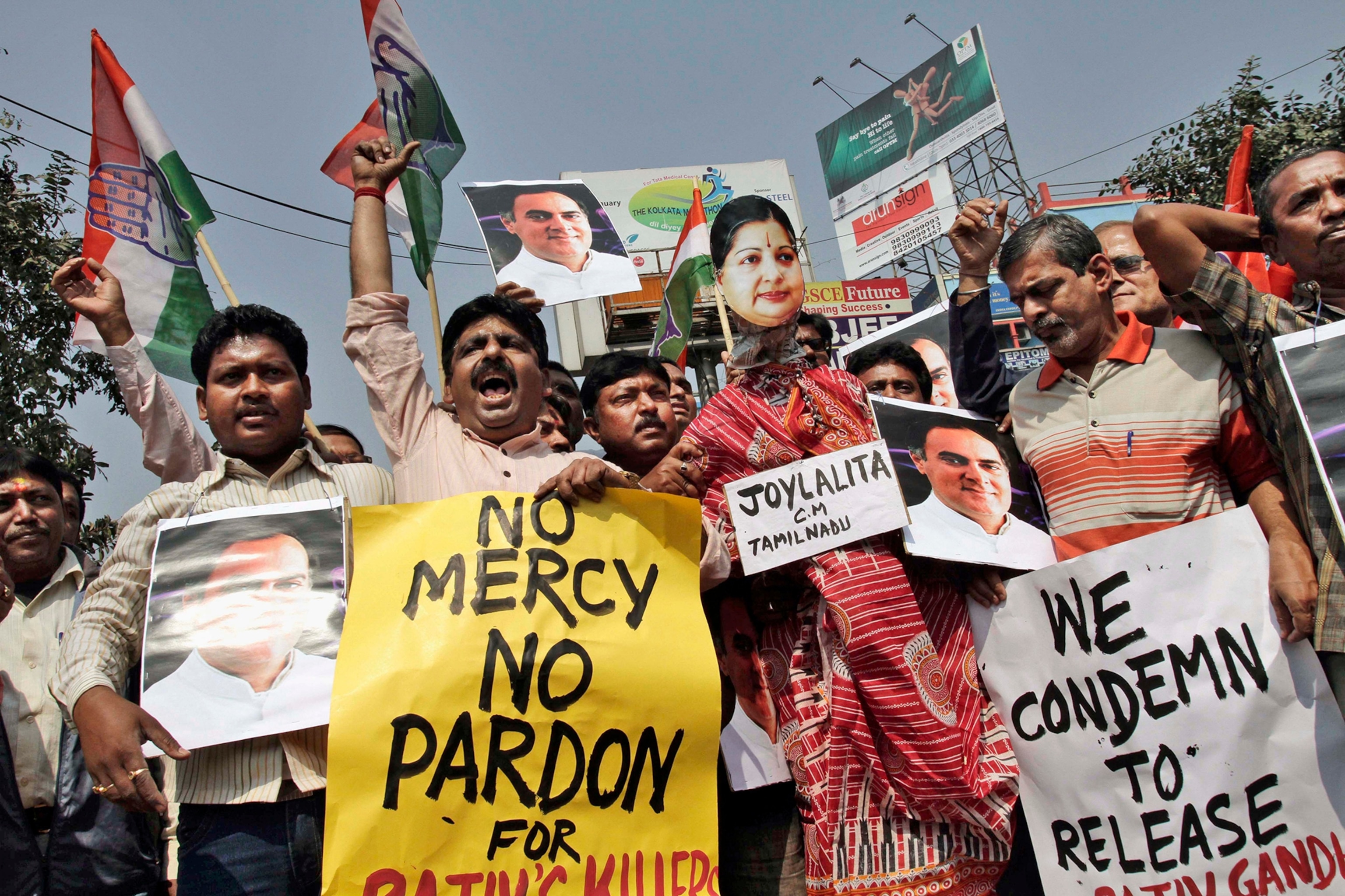 India’s ruling Congress Party supporters shout slogans during a protest against Tamil Nadu State Chief Minister Jayaram Jayalalitha, in Kolkata, India, Saturday, Feb. 22, 2014.
