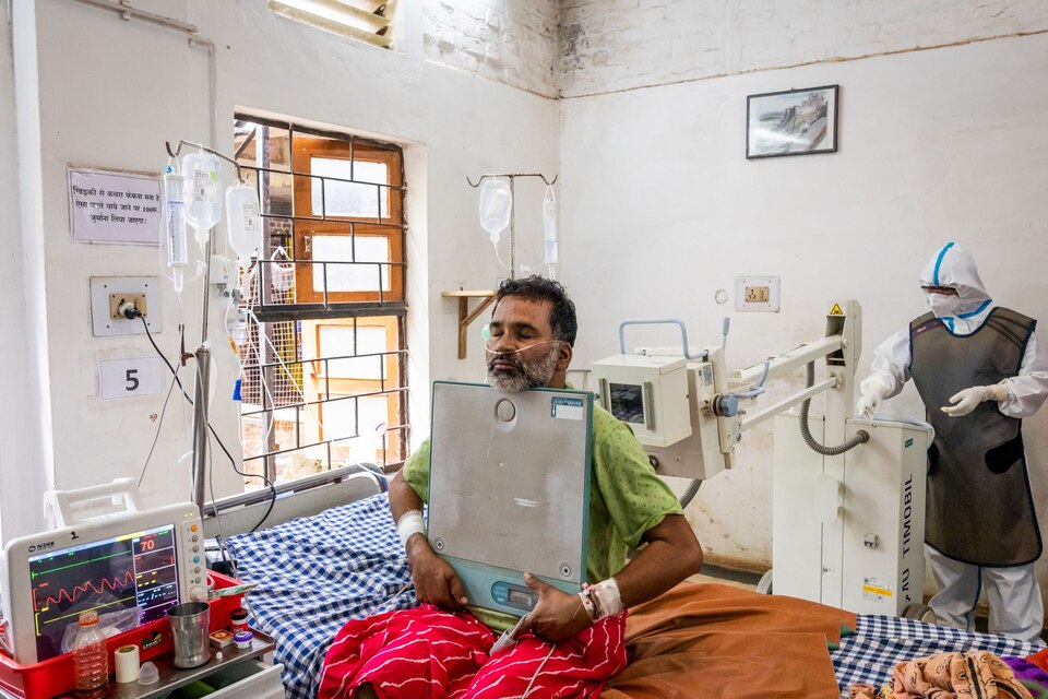 Man receives a chest X-Ray.