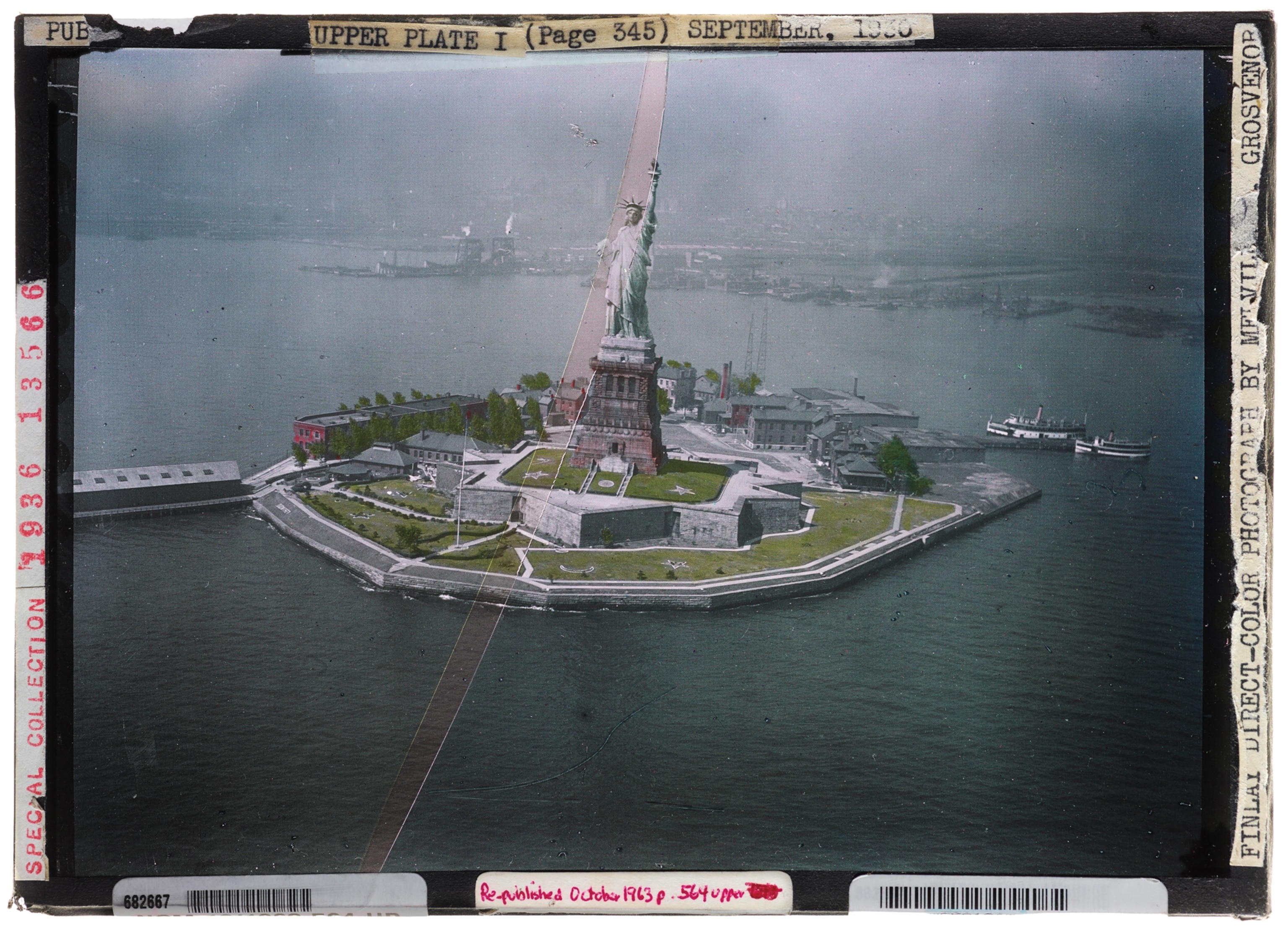 Aerial view of Stature of Liberty. Glass plate with notes around perimeter of the frame.