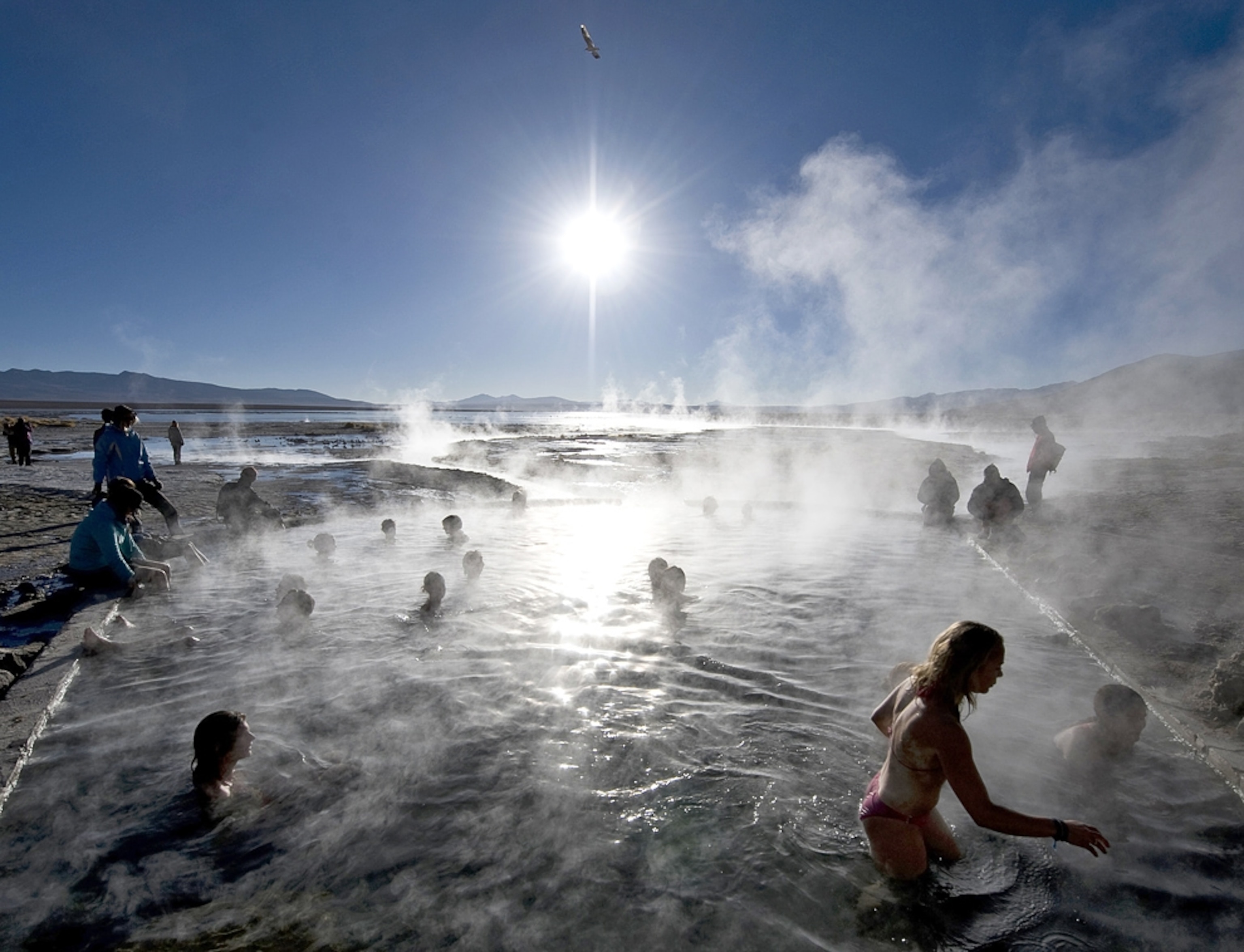 Tourists bathing in hot springs near the small village of Agua Brava, Bolivia