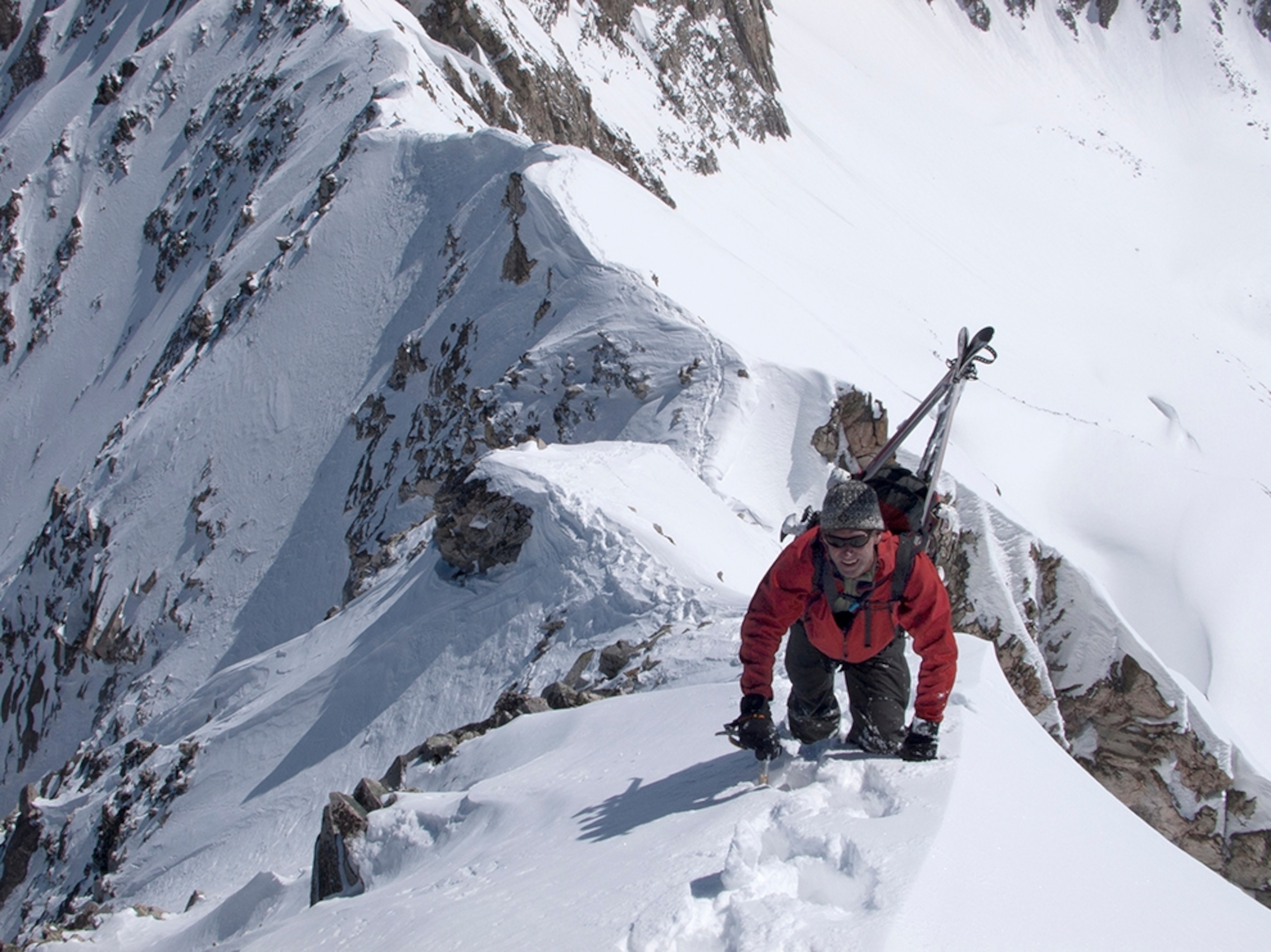 a skier climbing Capitol Peak, Colorado