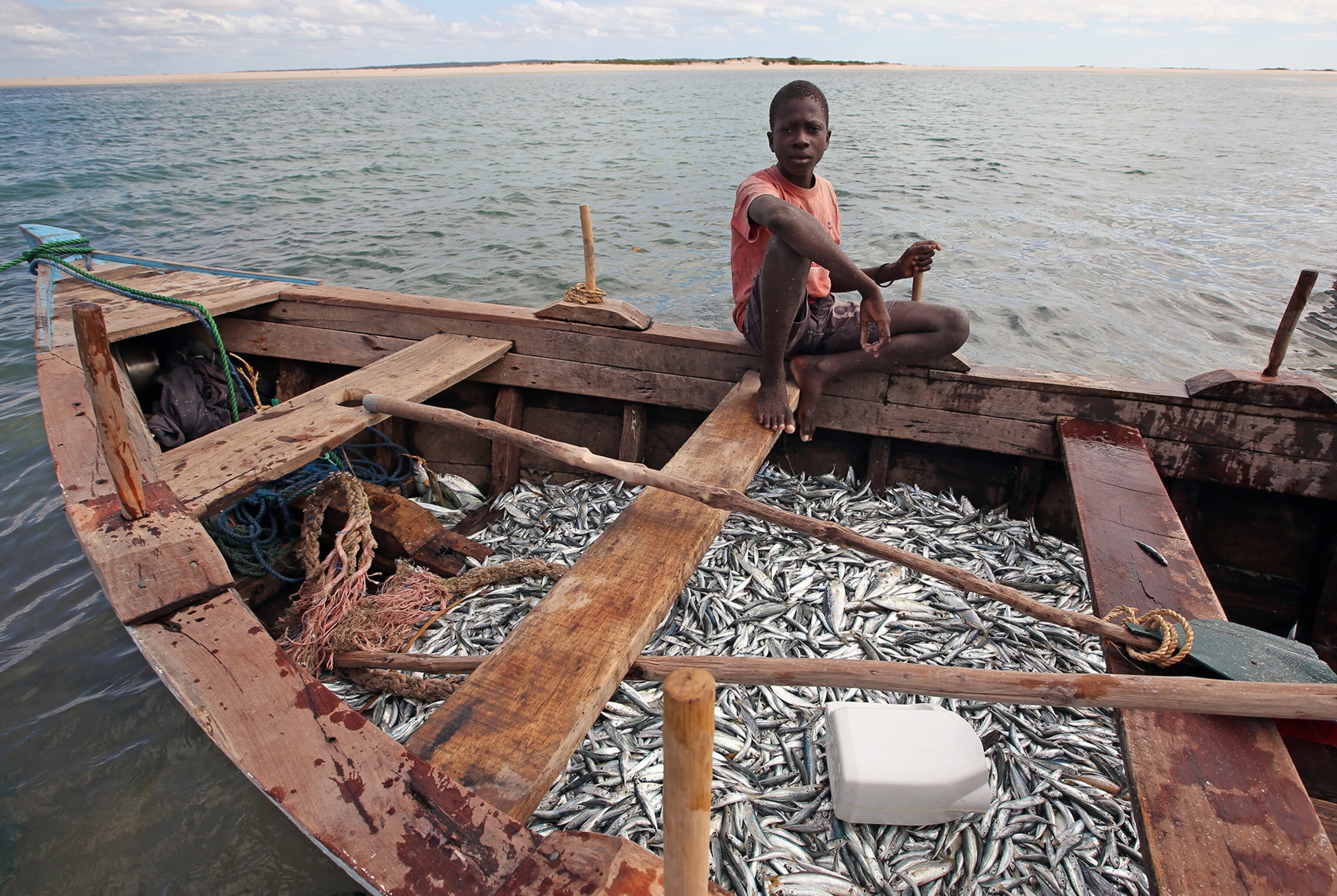a boy fishing in Mozambique