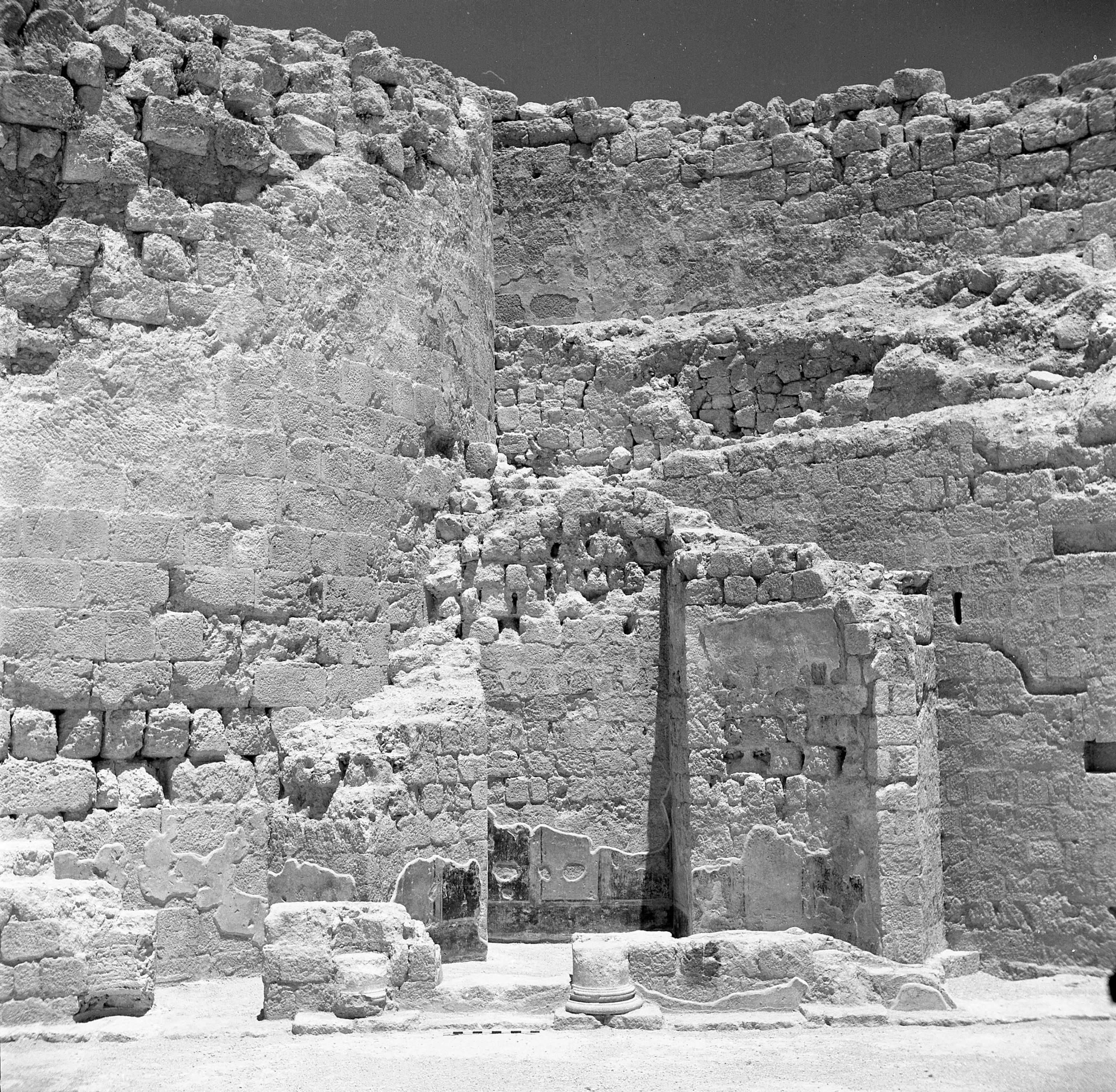An ancient wall is photographed at the site of the expedition
