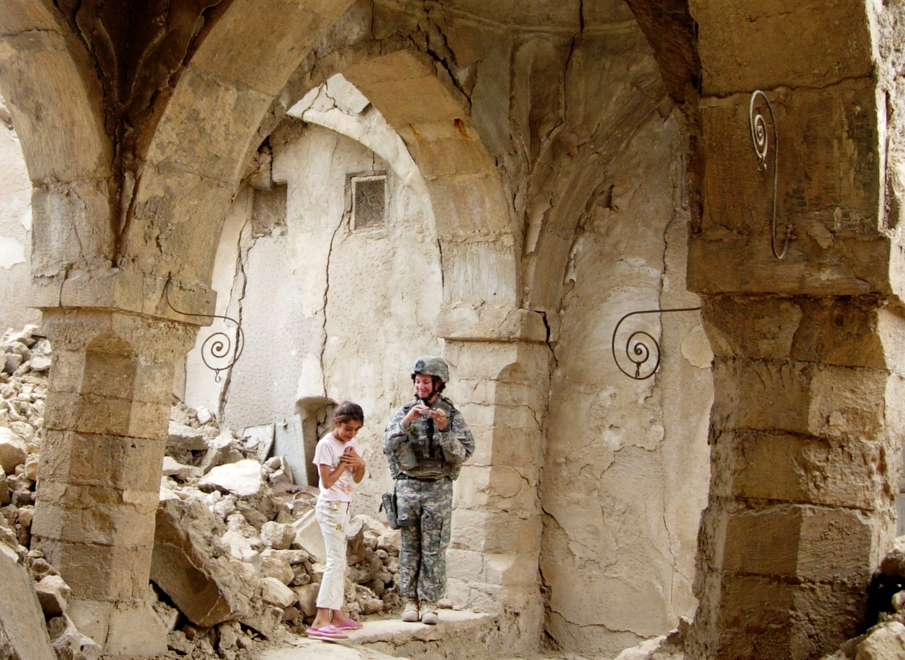heritage expert Heather Sprowls walking in an 800-year-old synagogue