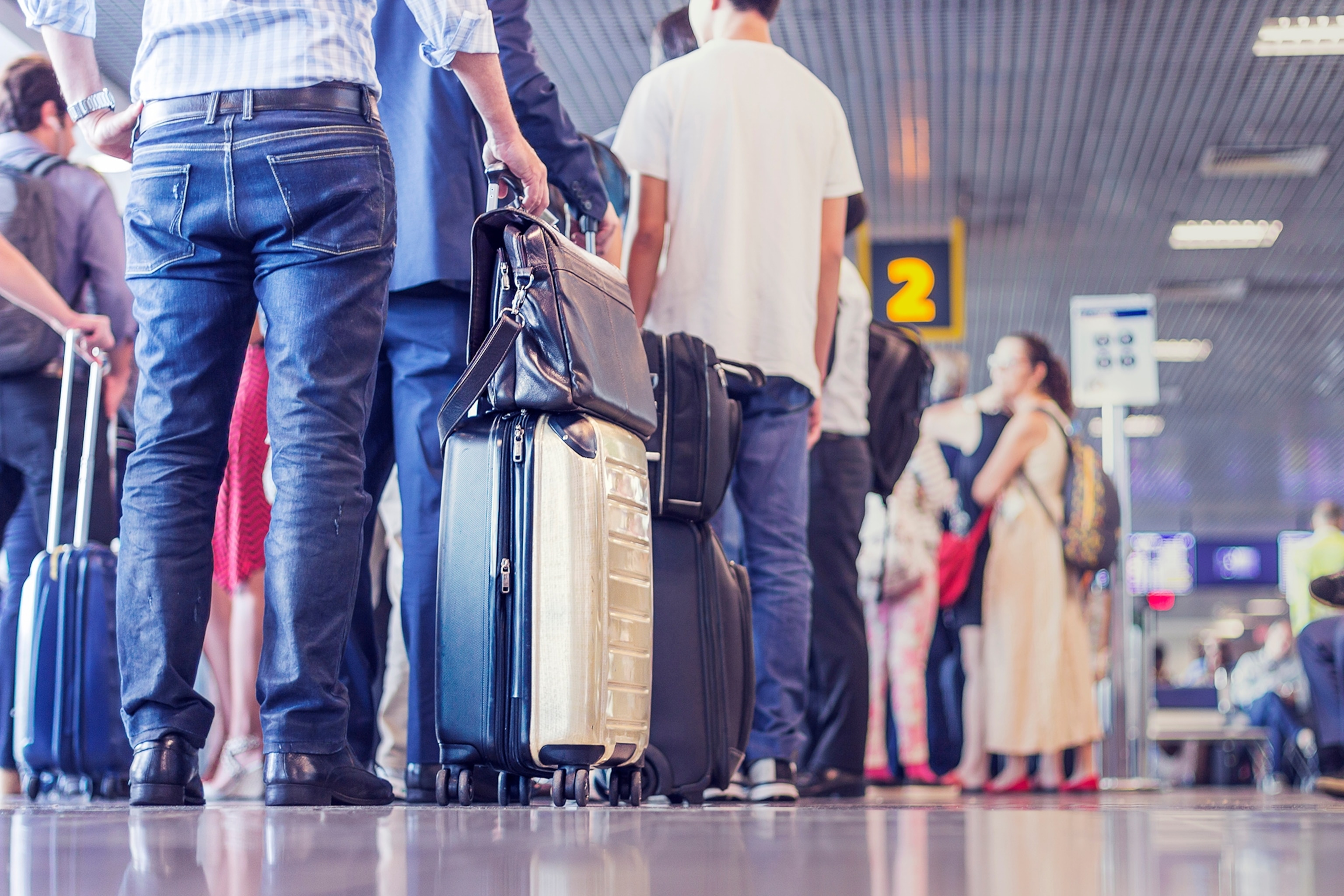 people queing at the airport