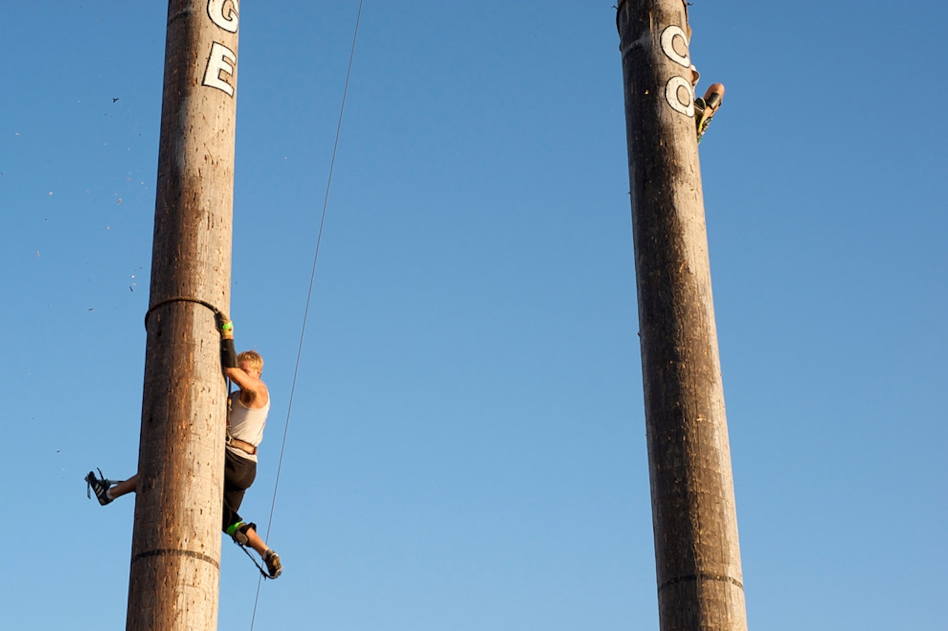 Man climbing pole