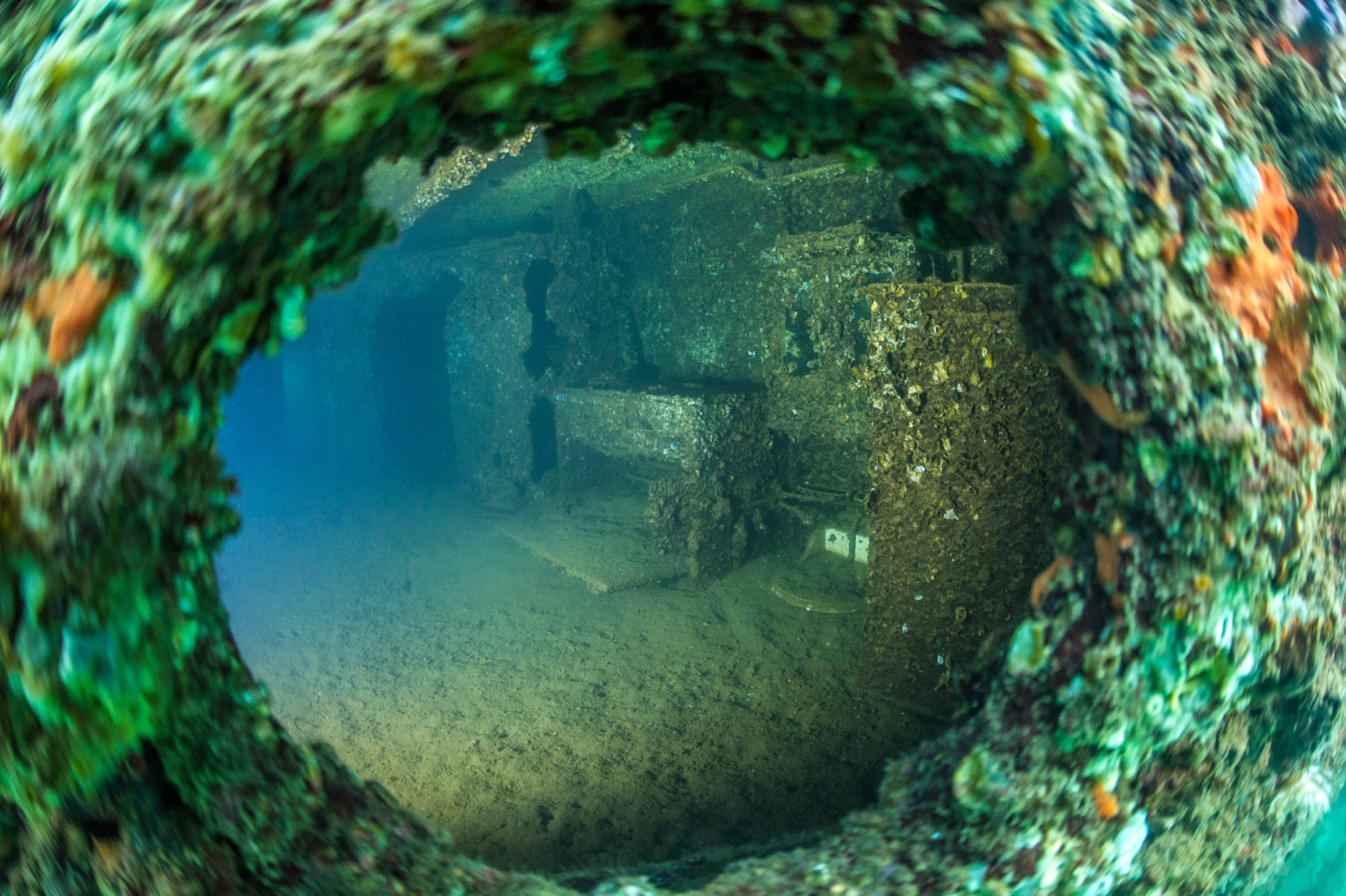 underwater porthole, looking into a room