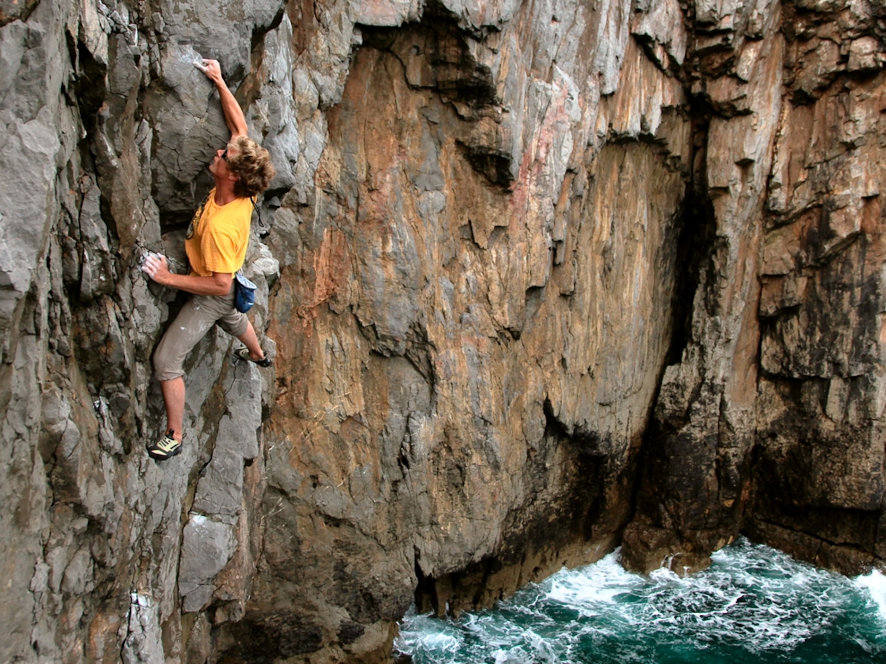 A rock climber on the Pembrokeshire Coast