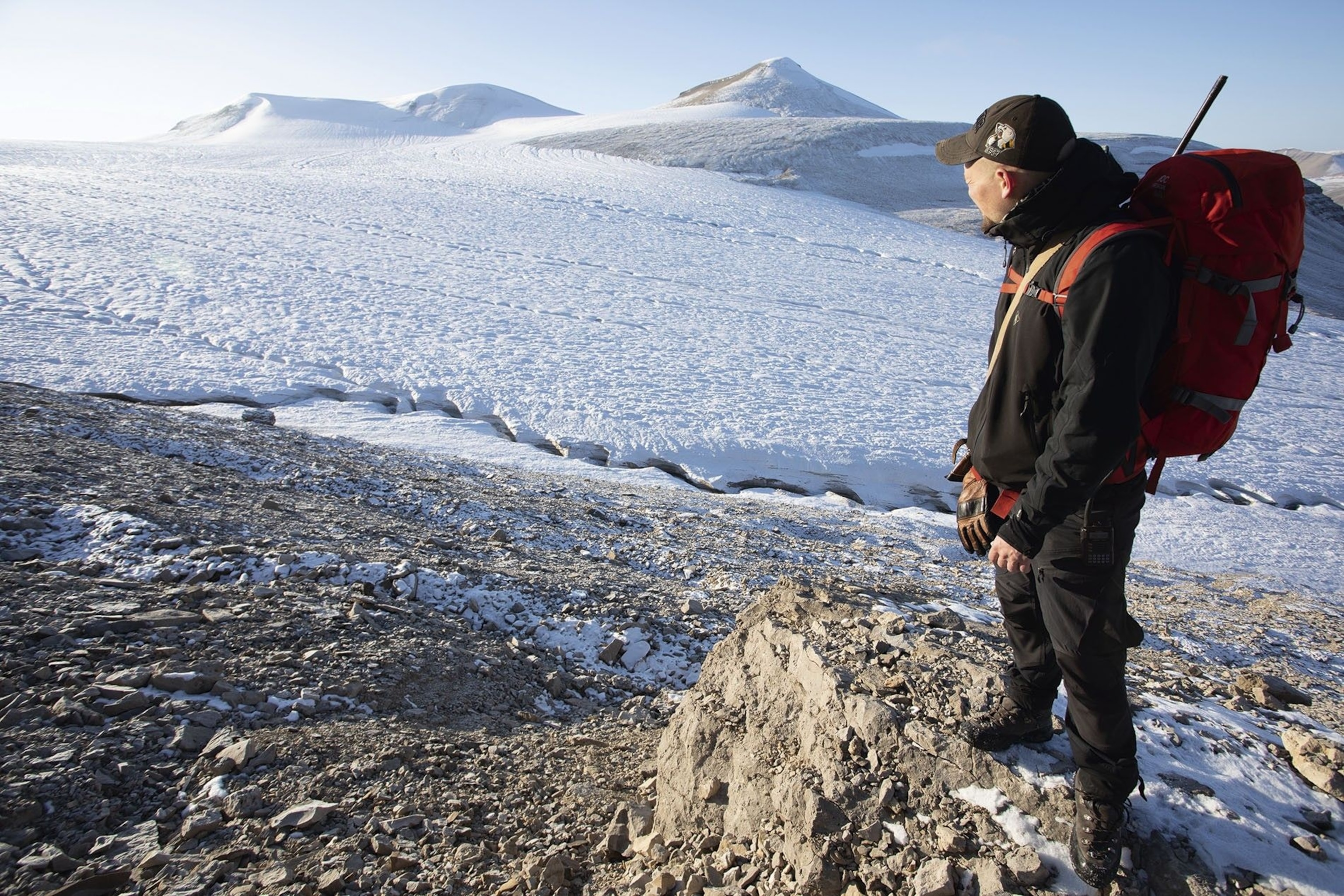 Sergey looking over a glacier.