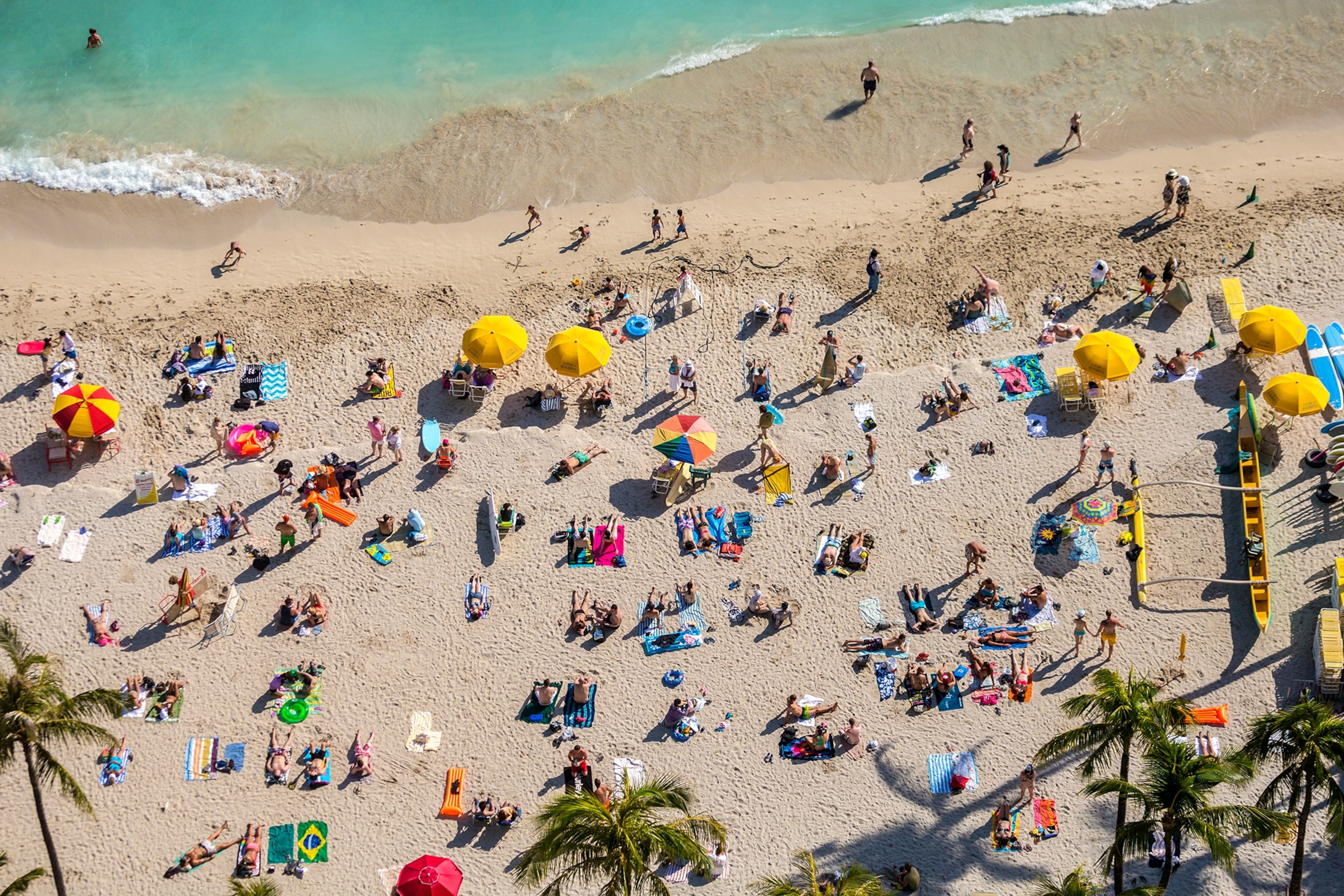 people on the beach in Oahu Island, Hawaii
