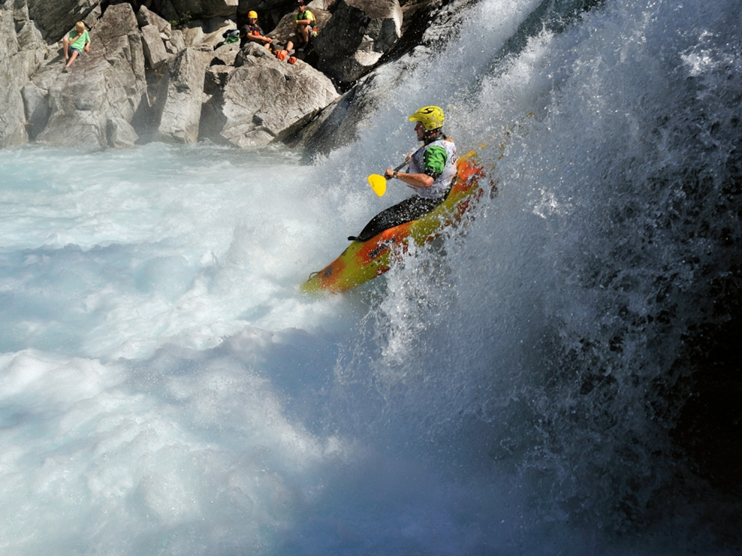 Kayaker dropping down a waterfall in Voss, Norway