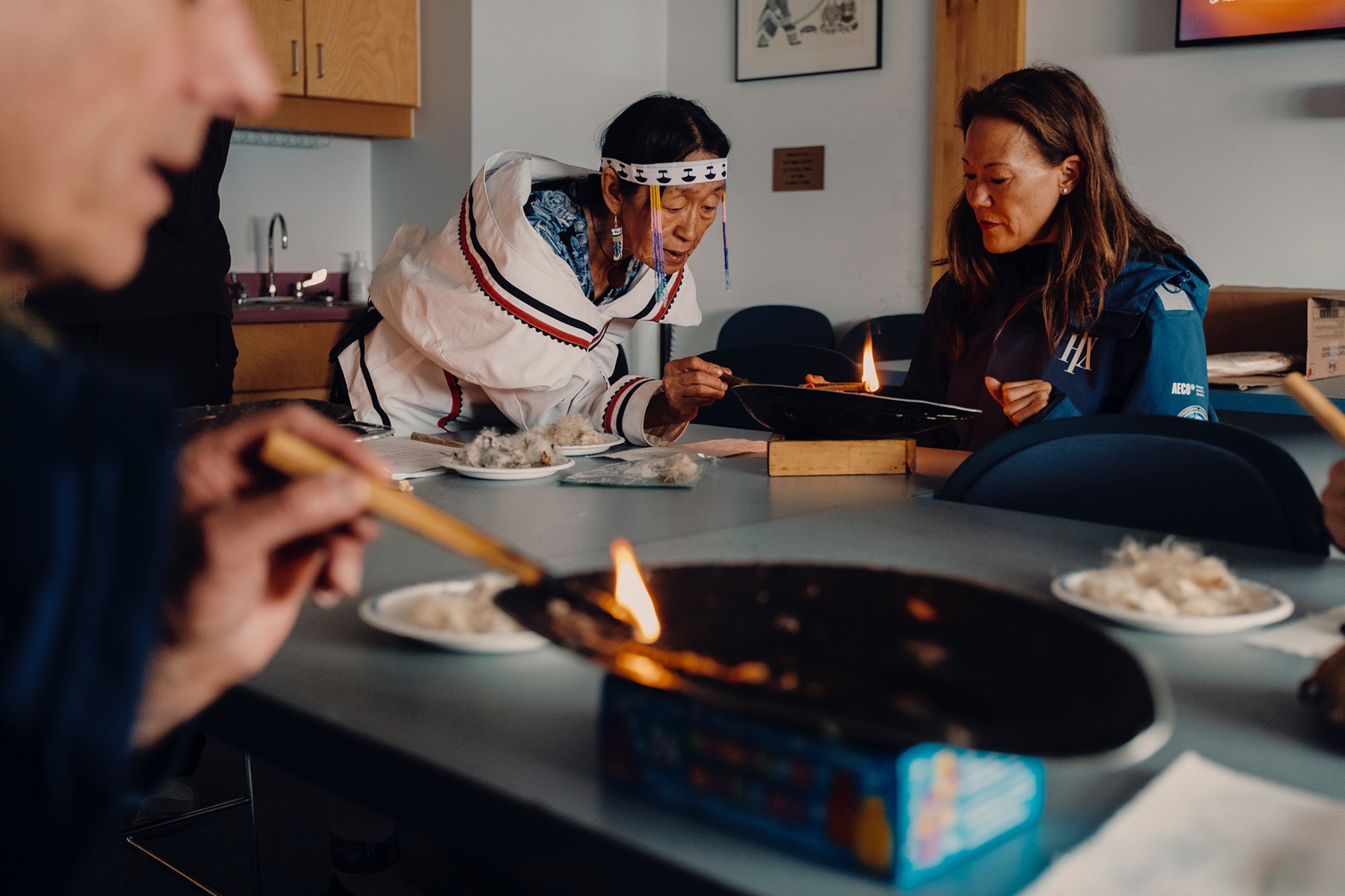 HX guests learn about Arctic Char from a local fisherman in Gjoa Haven