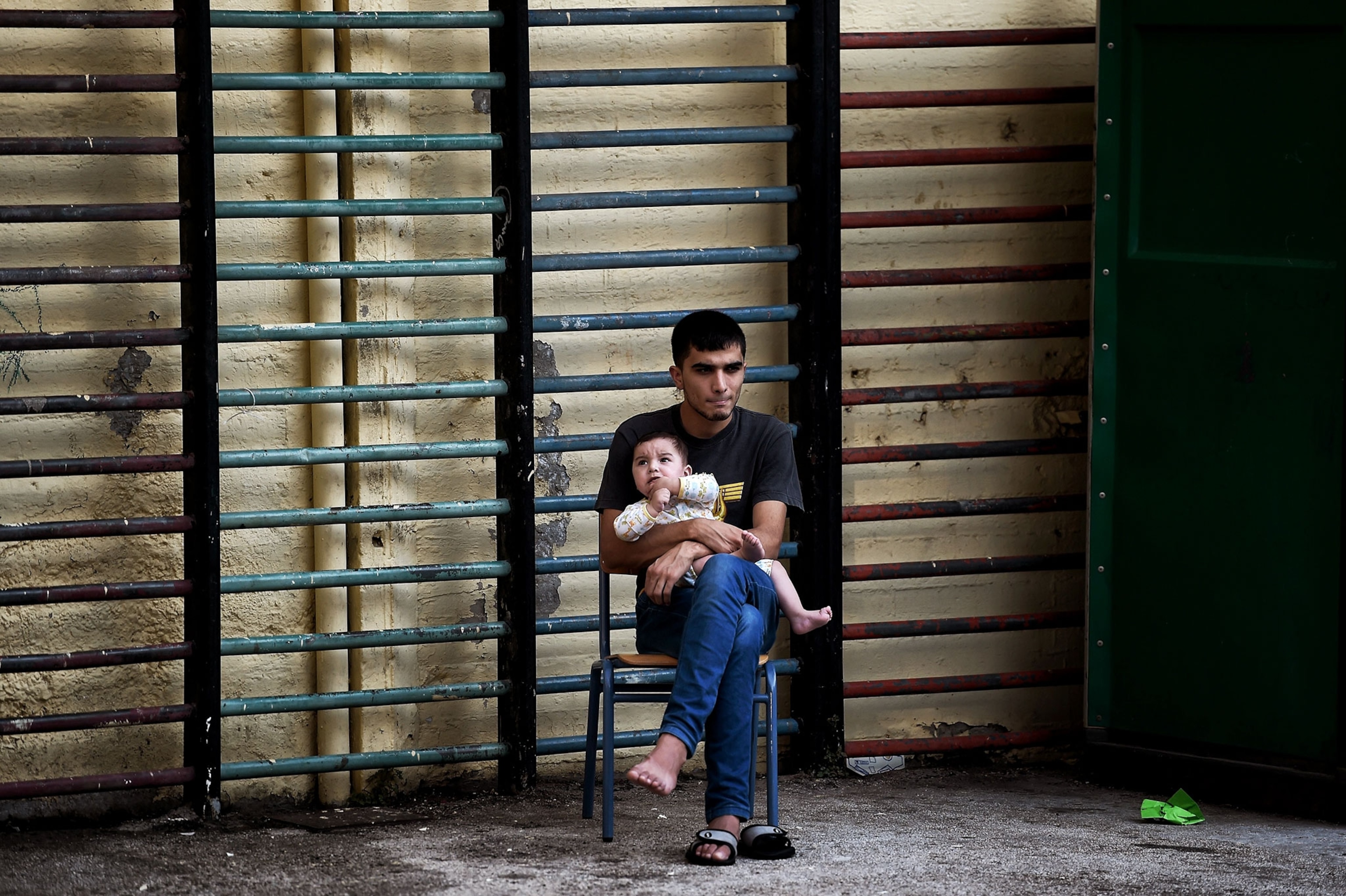 a man holding a child